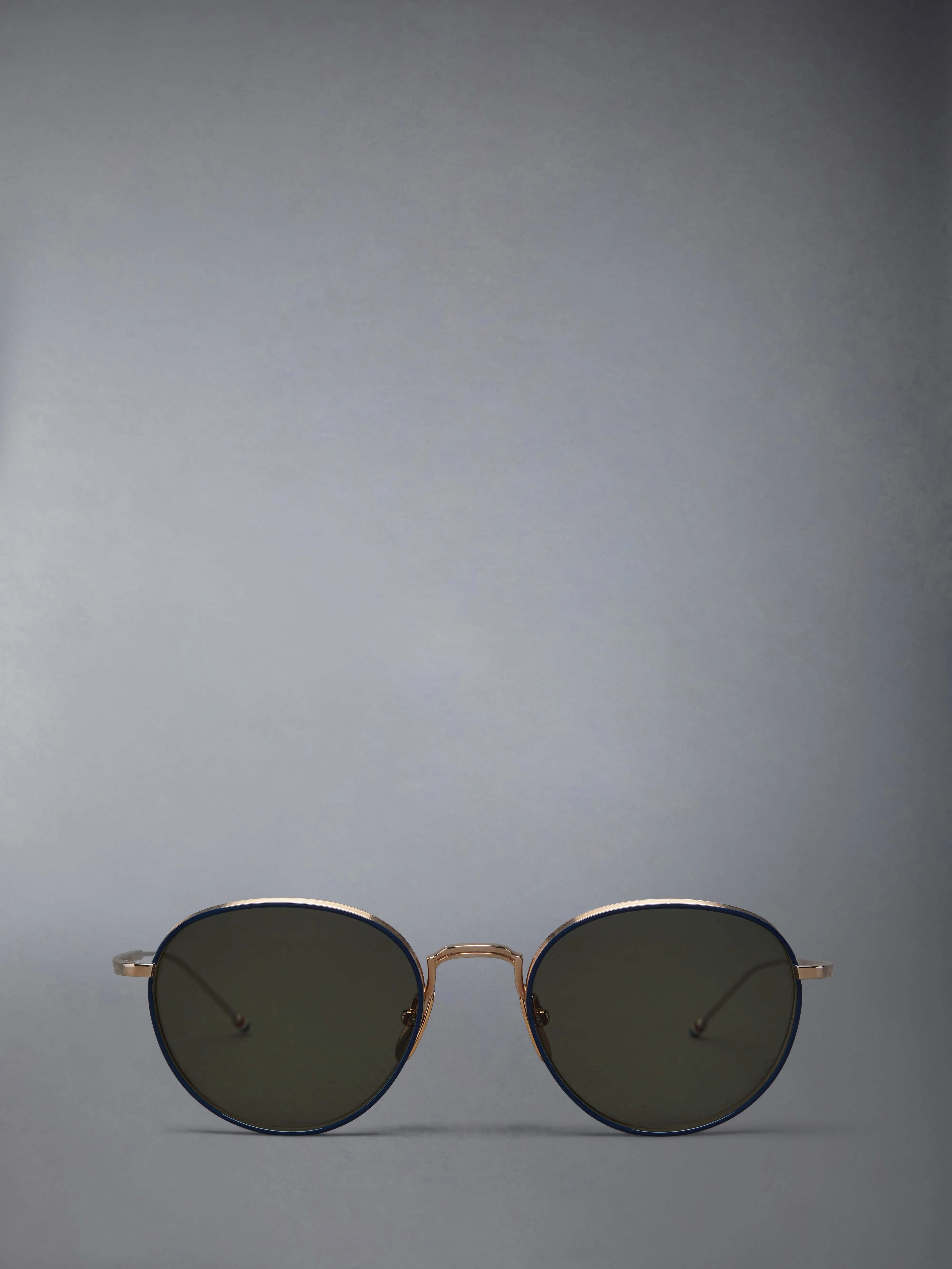 TITANIUM ROUND SUNGLASSES sold by Thom Browne