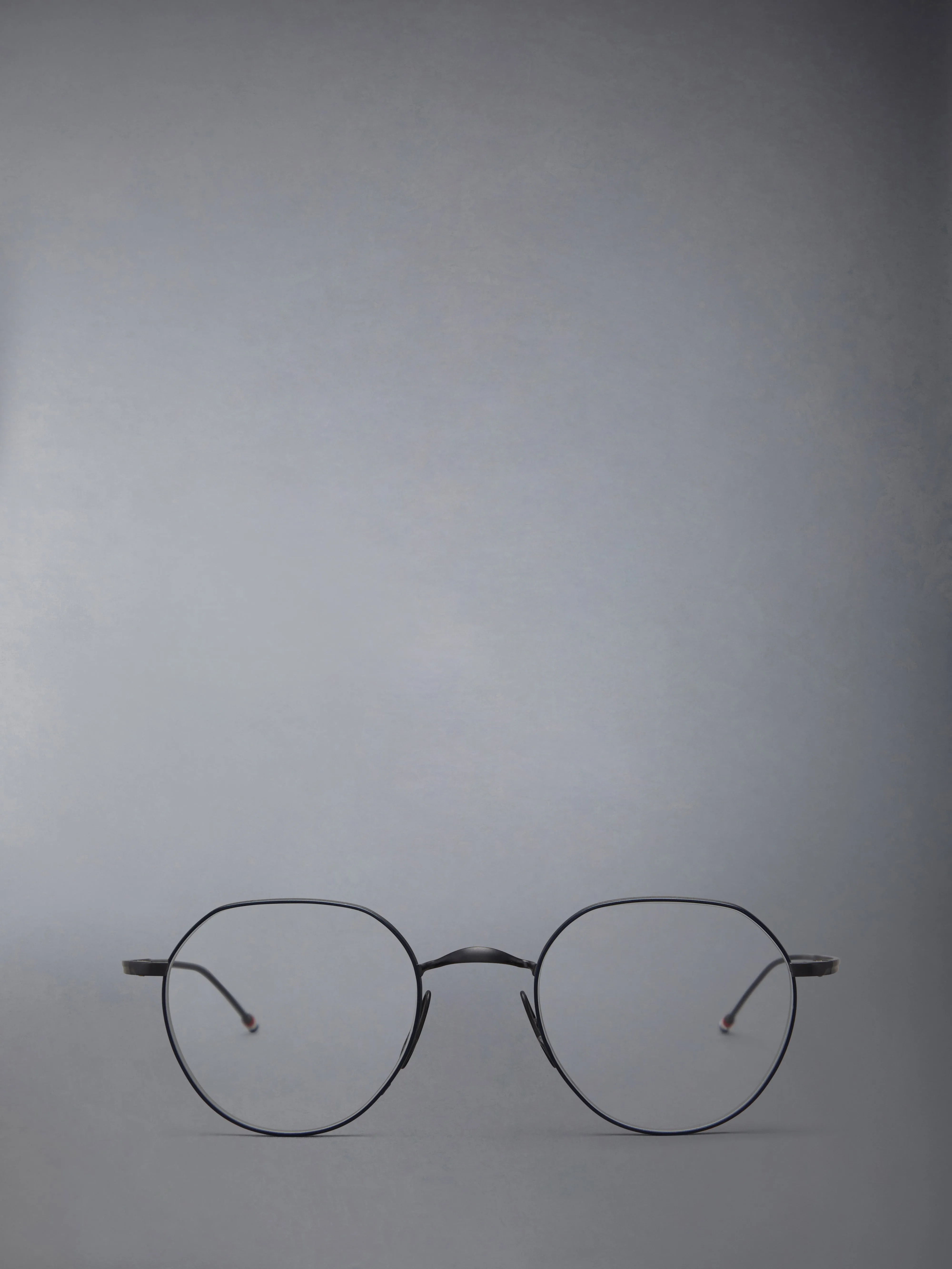 TITANIUM ROUND EYEGLASSES sold by Thom Browne