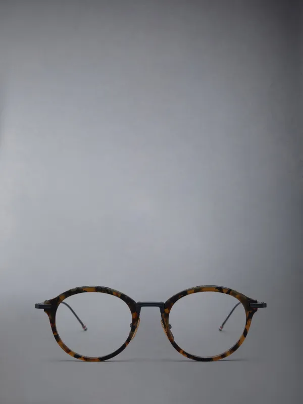 ACETATE AND TITANIUM ROUND EYEGLASSES sold by Thom Browne