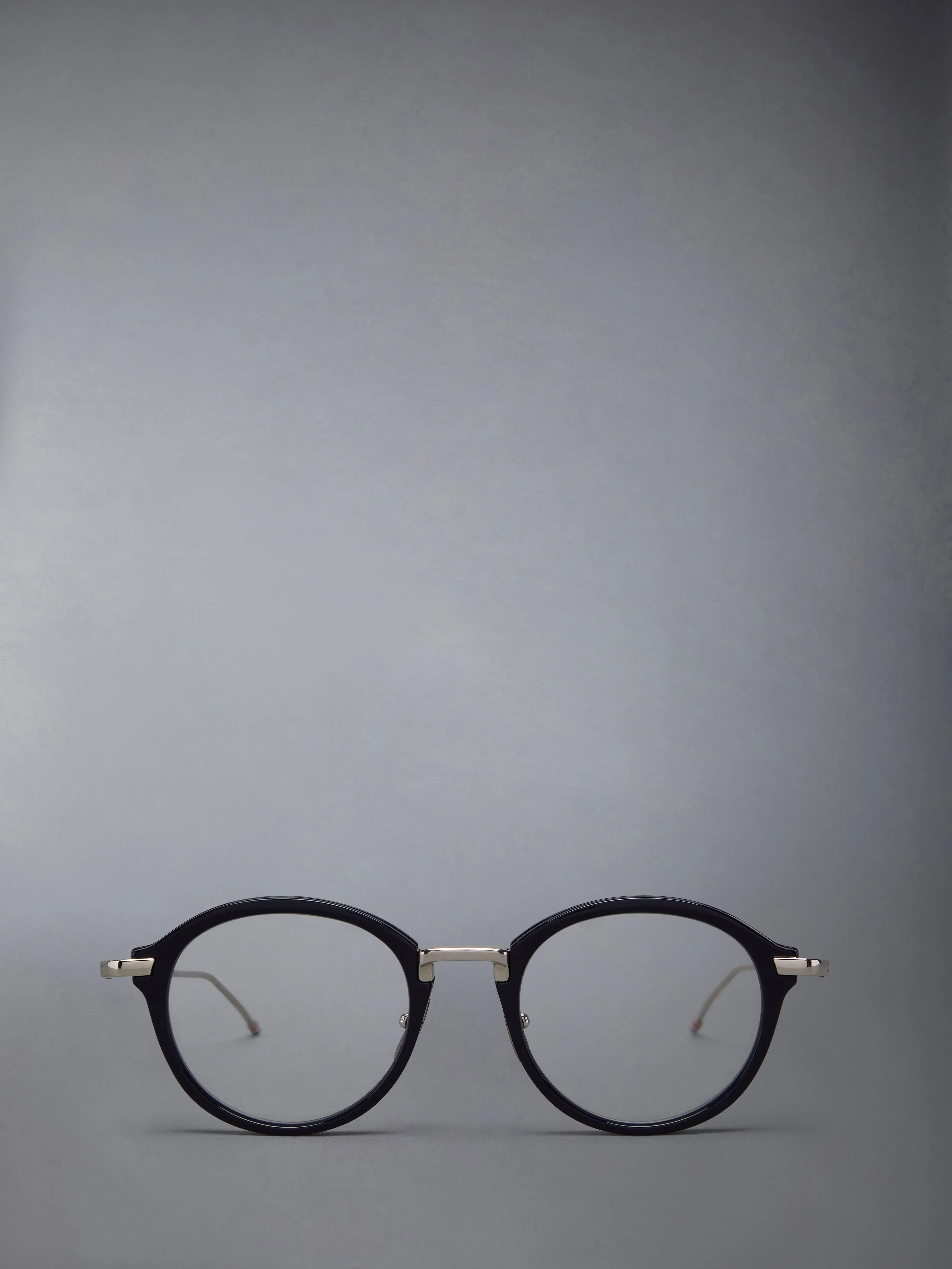 ACETATE AND TITANIUM ROUND EYEGLASSES sold by Thom Browne