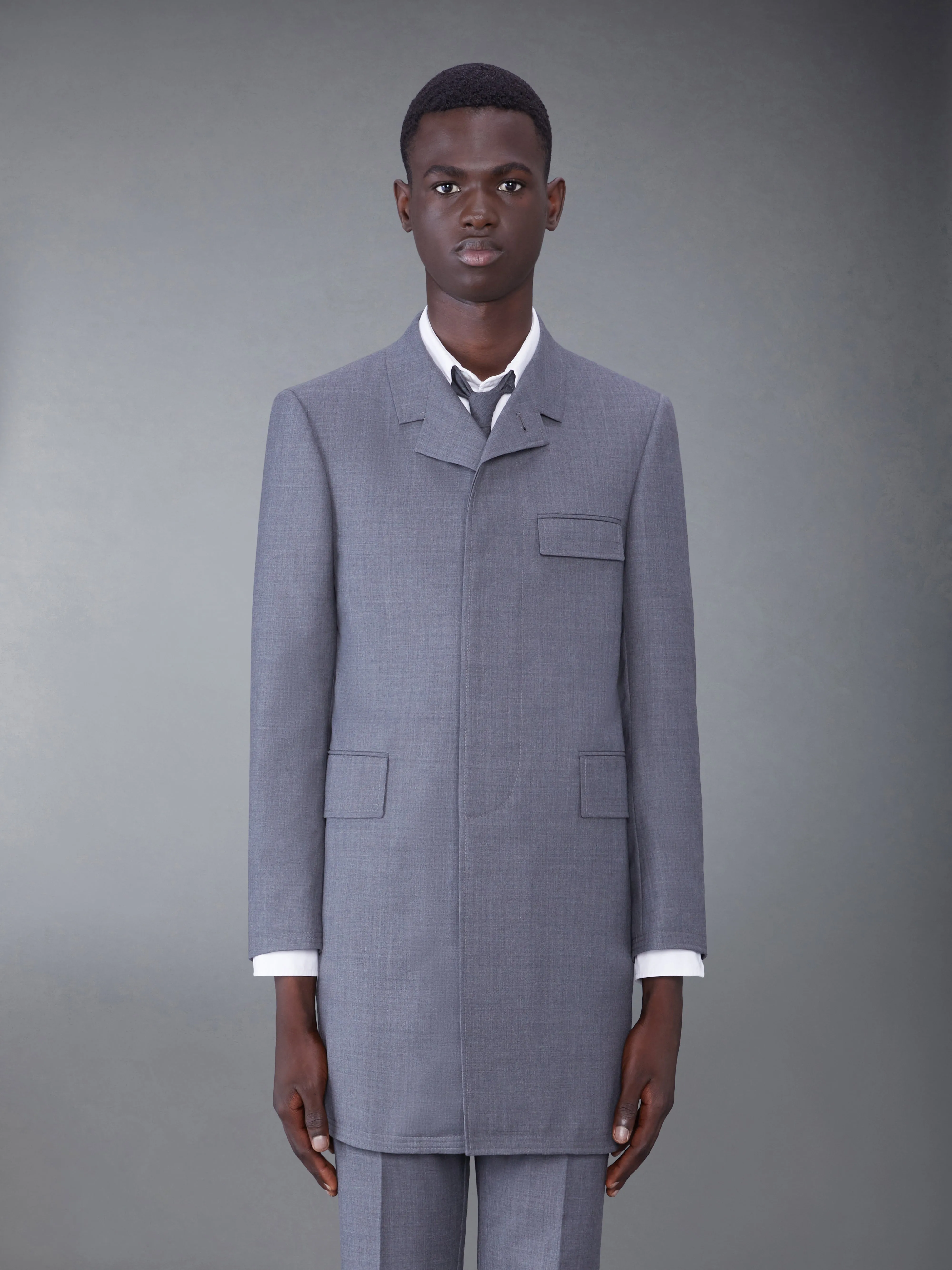 TWILL WOOL CLASSIC CHESTERFIELD OVERCOAT sold by Thom Browne