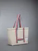 DOUBLE FACE CANVAS SMALL TOOL TOTE sold by Thom Browne