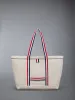 DOUBLE FACE CANVAS SMALL TOOL TOTE sold by Thom Browne