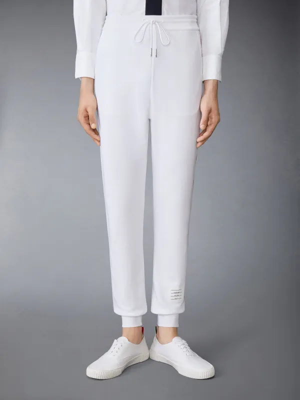 CLASSIC LOOPBACK STRIPE SWEATPANTS sold by Thom Browne
