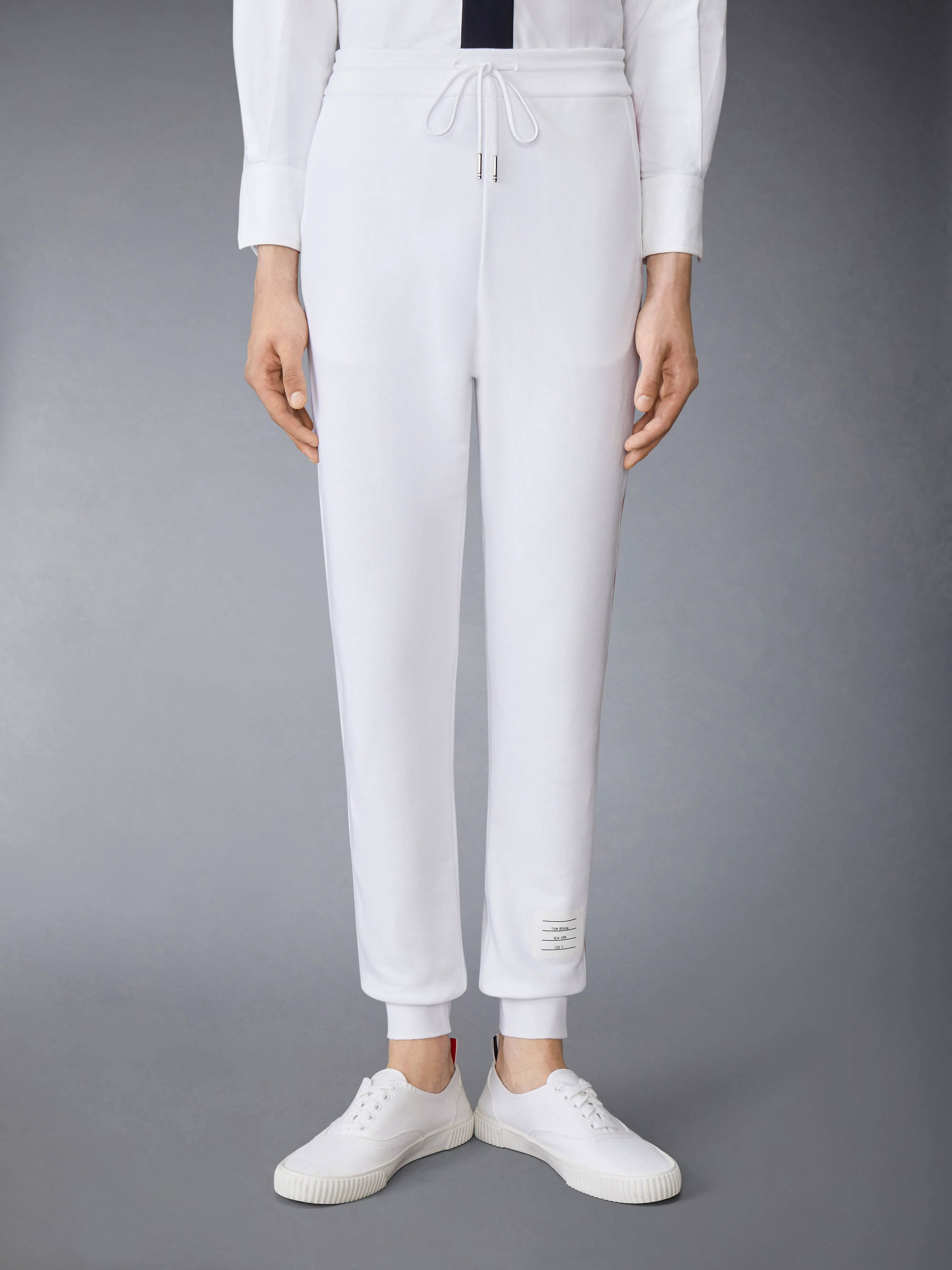 CLASSIC LOOPBACK STRIPE SWEATPANTS sold by Thom Browne