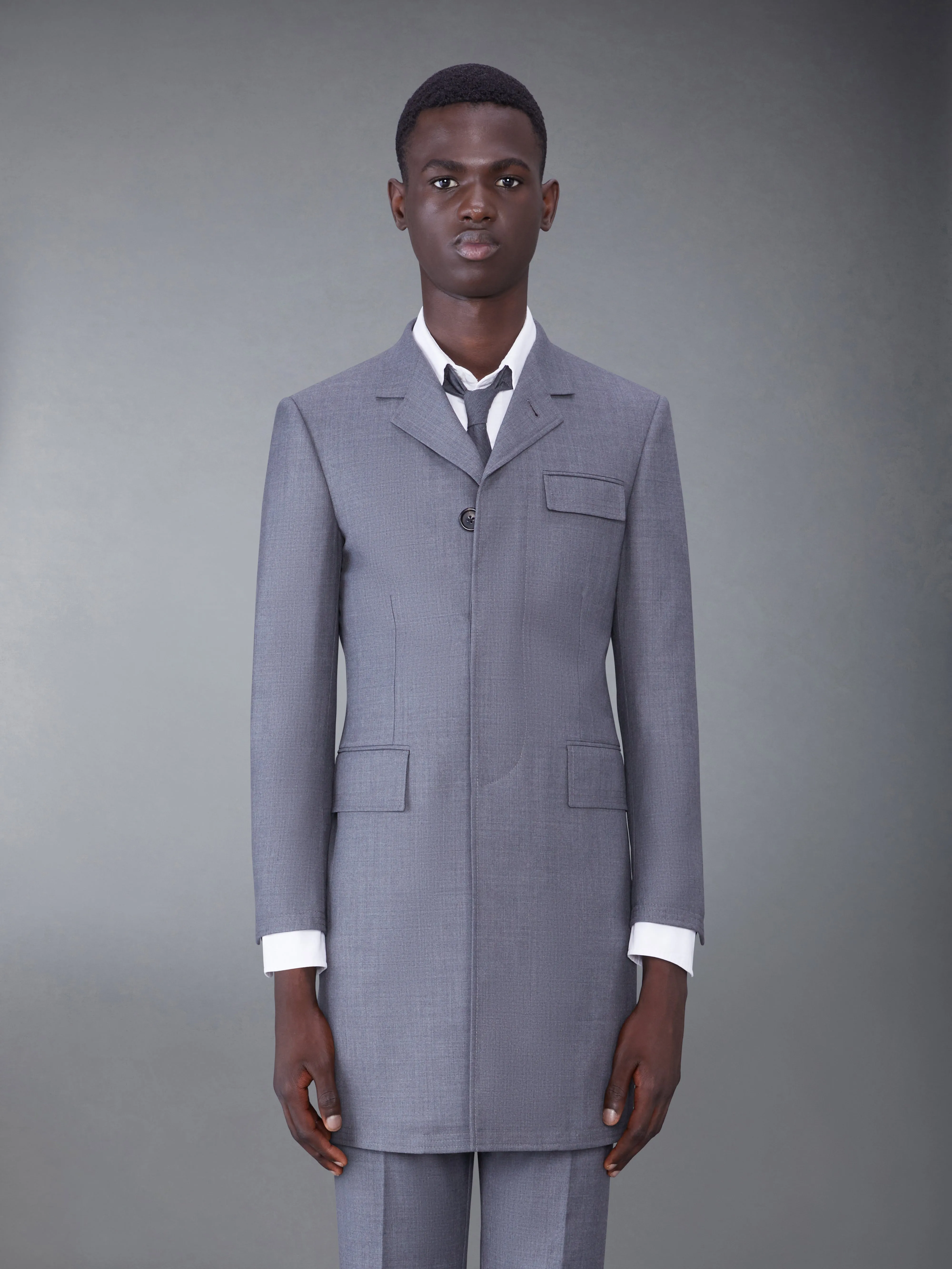 TWILL HIGH ARMHOLE CHESTERFIELD OVERCOAT sold by Thom Browne