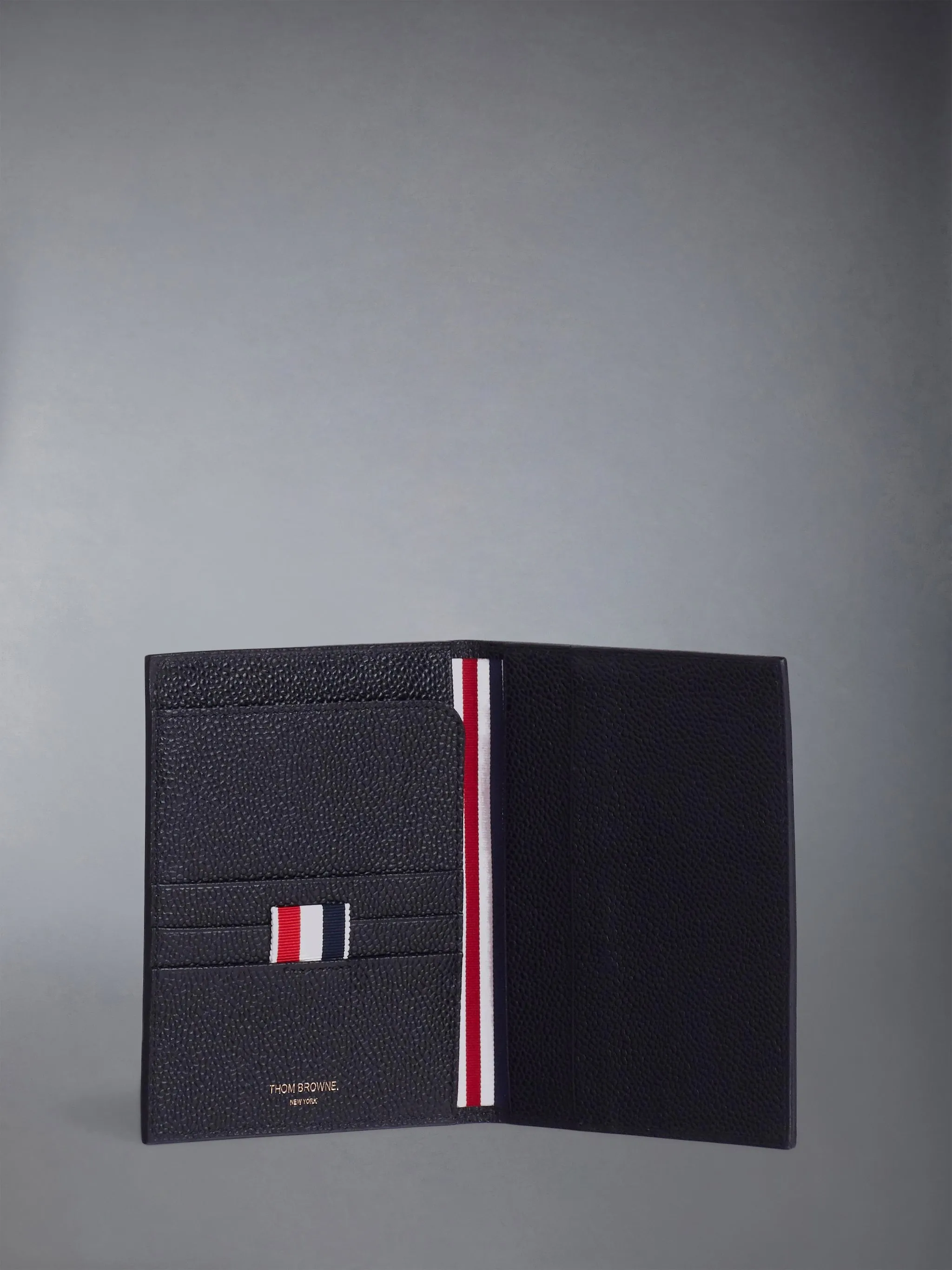 PEBBLE GRAIN PASSPORT HOLDER sold by Thom Browne