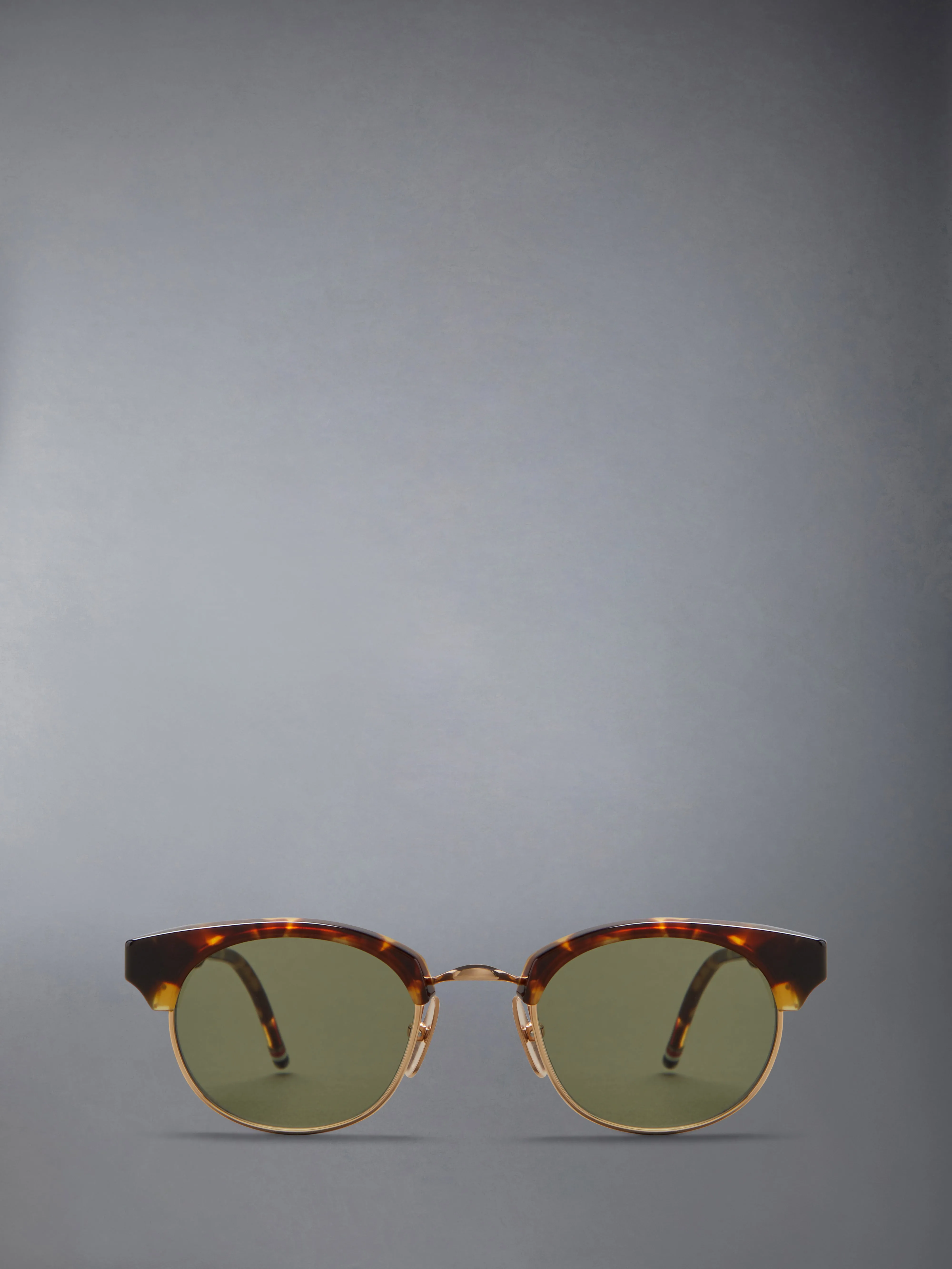 ACETATE AND TITANIUM OVAL SUNGLASSES sold by Thom Browne