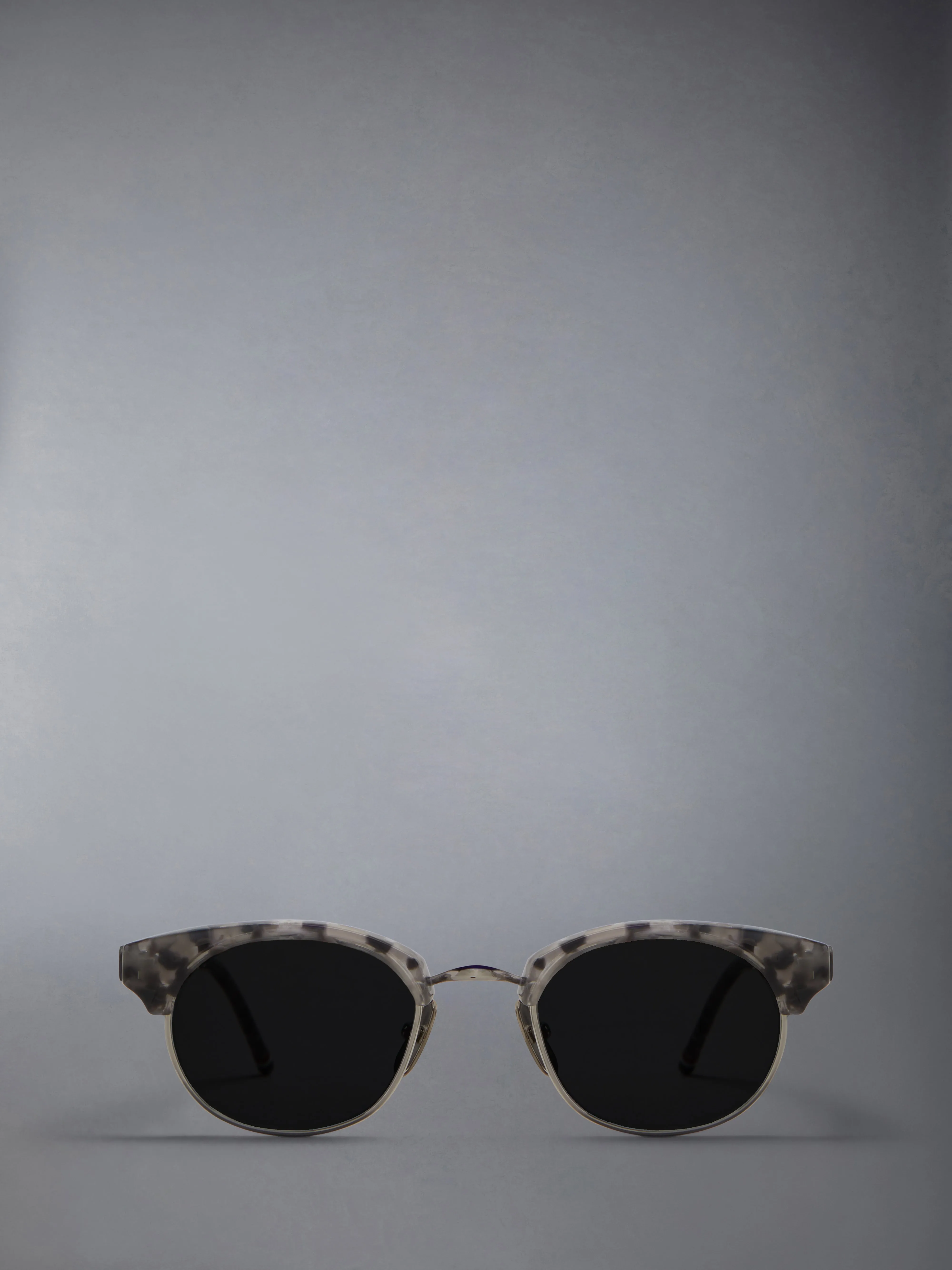 ACETATE AND TITANIUM OVAL SUNGLASSES sold by Thom Browne