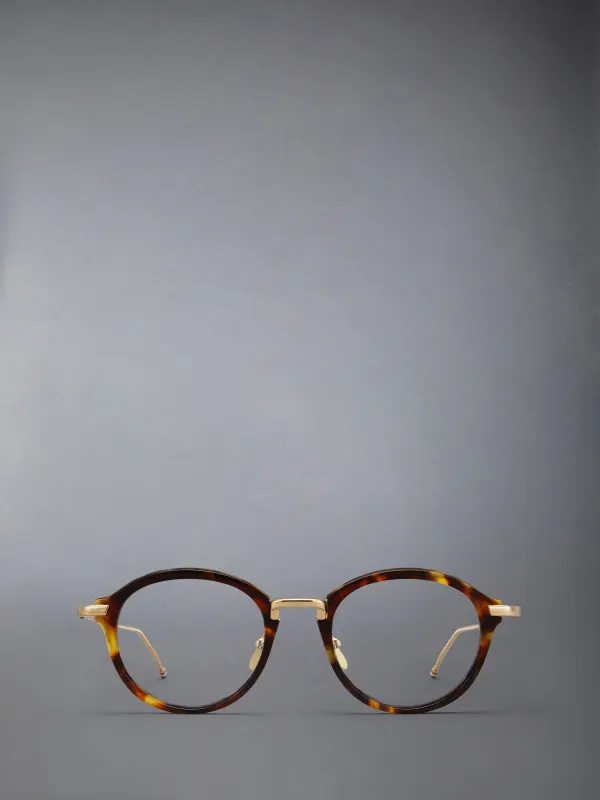 ACETATE AND TITANIUM ROUND EYEGLASSES sold by Thom Browne