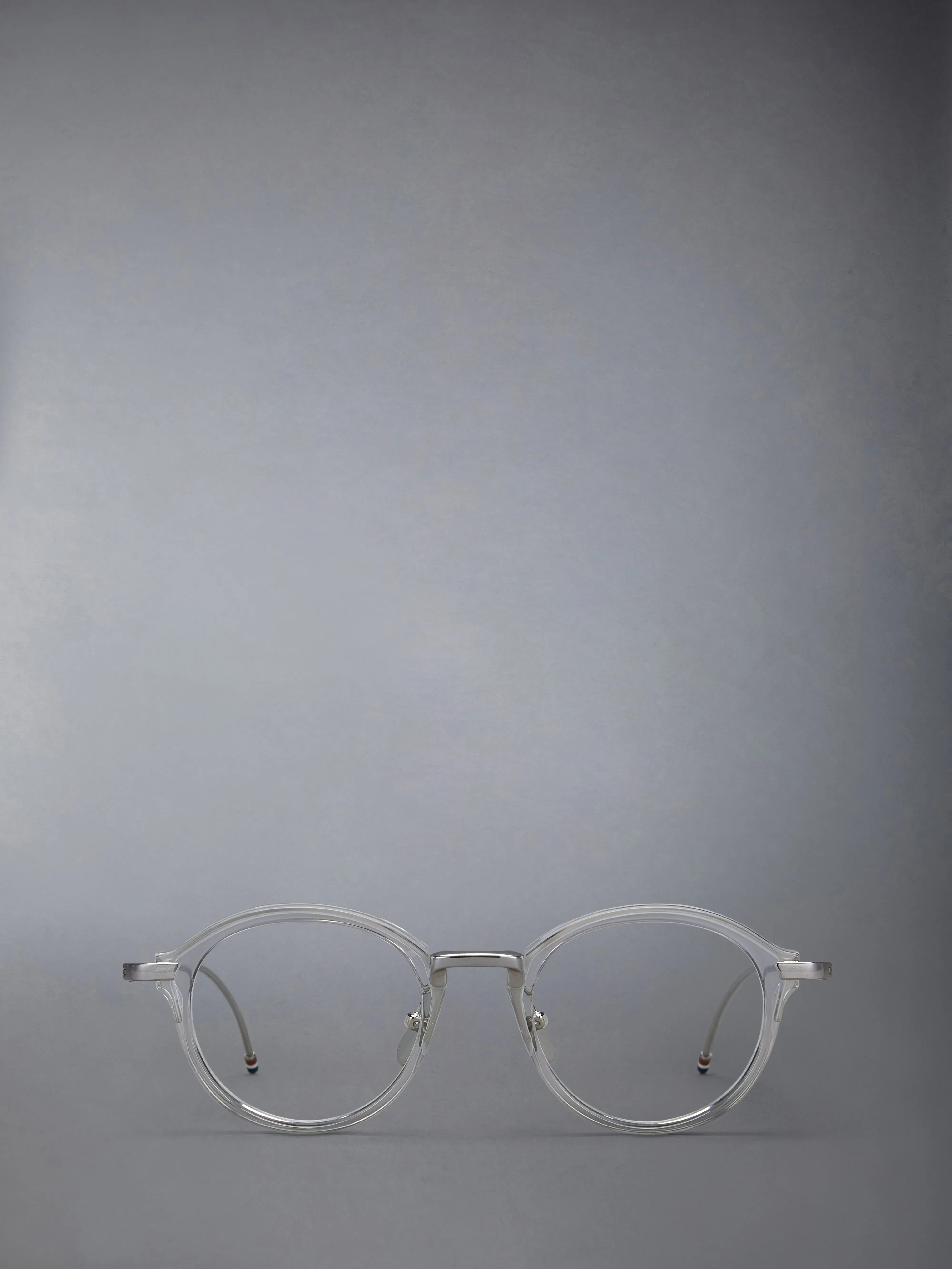 ACETATE AND TITANIUM ROUND EYEGLASSES sold by Thom Browne