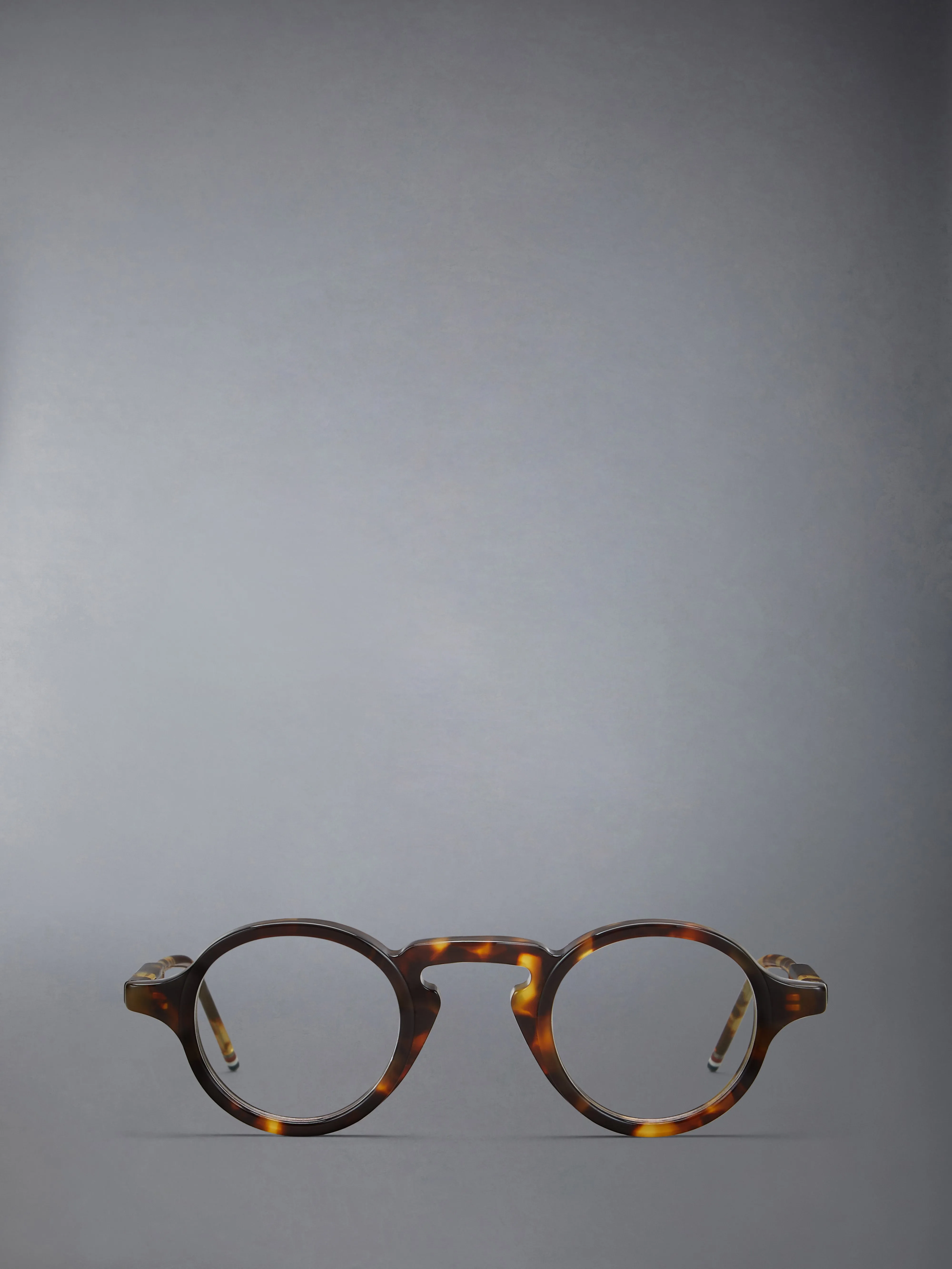 ACETATE ROUND EYEGLASSES sold by Thom Browne