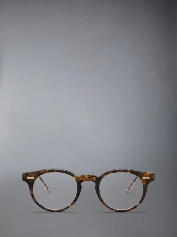 ACETATE ROUND EYEGLASSES sold by Thom Browne