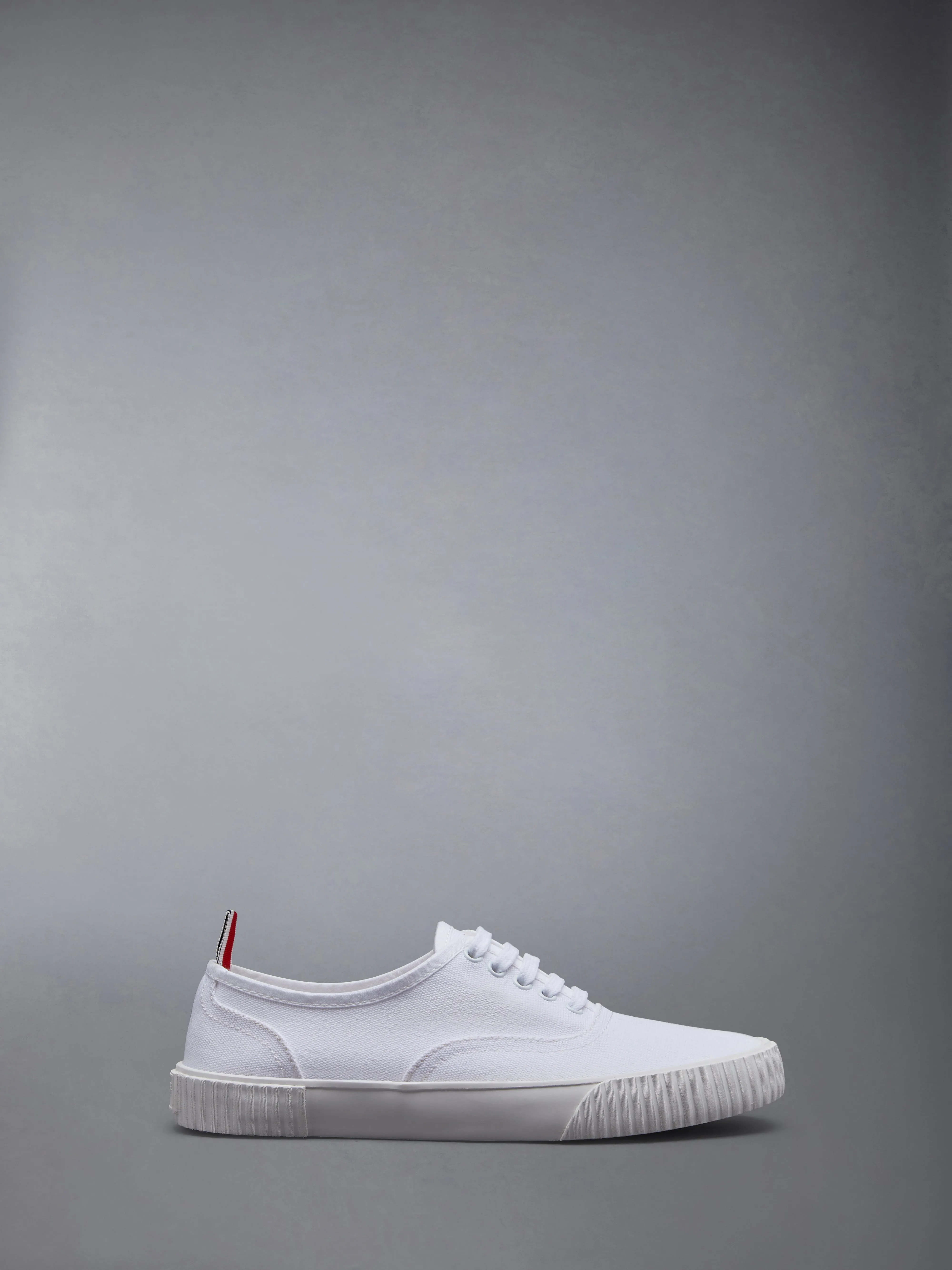 CANVAS HERITAGE SNEAKERS sold by Thom Browne