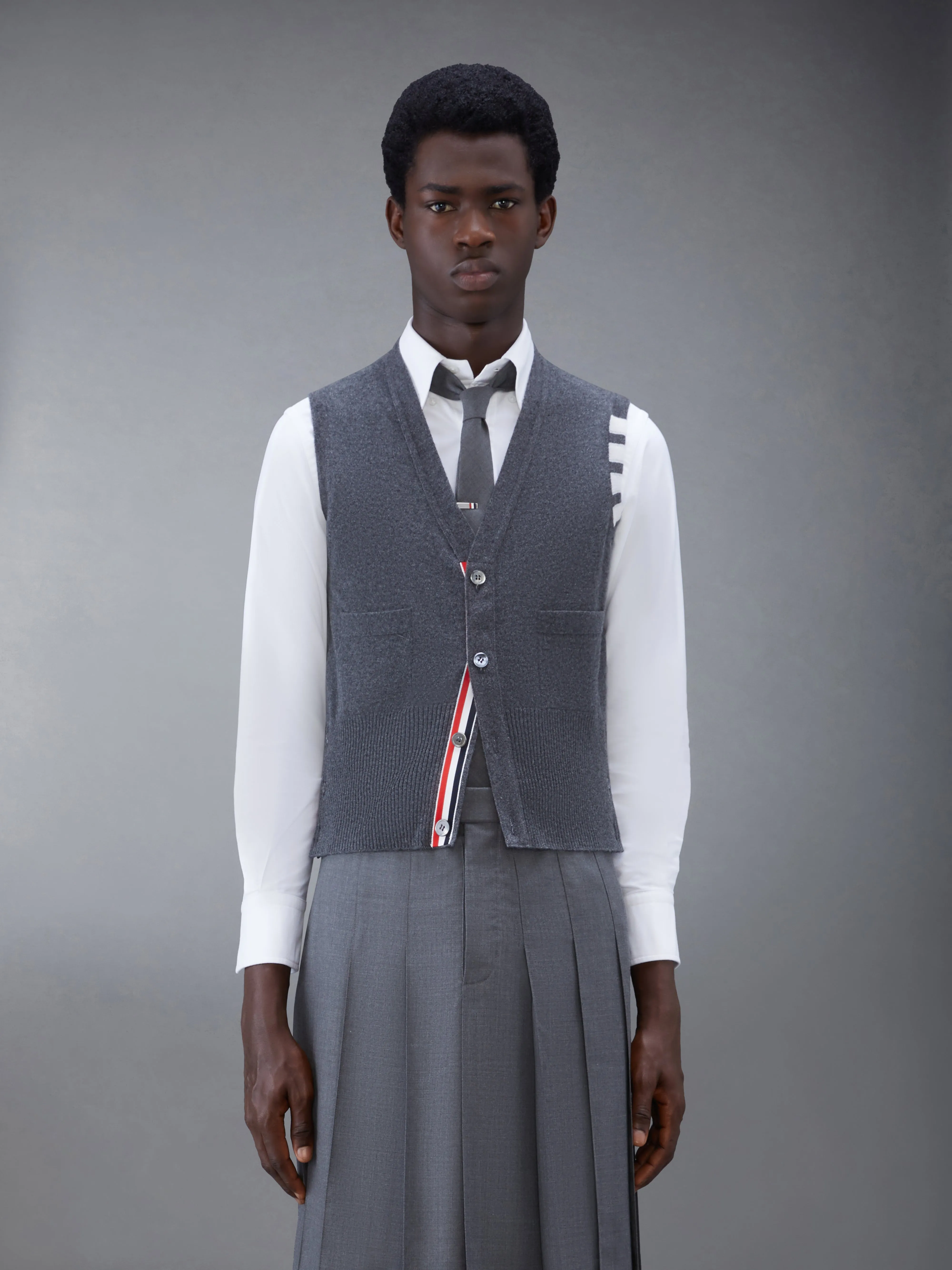 CLASSIC CASHMERE 4-BAR V-NECK CARDIGAN VEST sold by Thom Browne