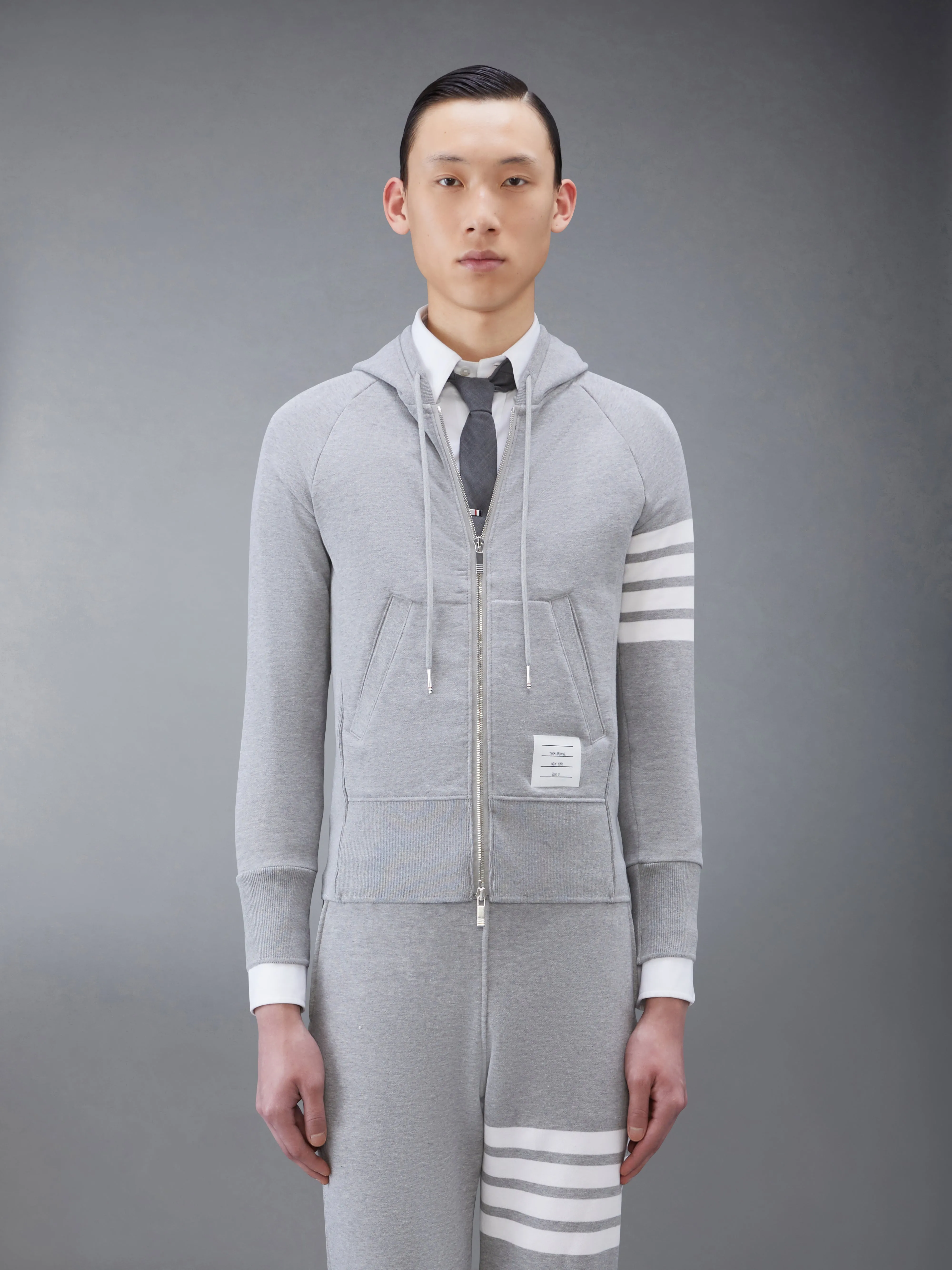 CLASSIC LOOPBACK 4-BAR FULL ZIP HOODIE sold by Thom Browne