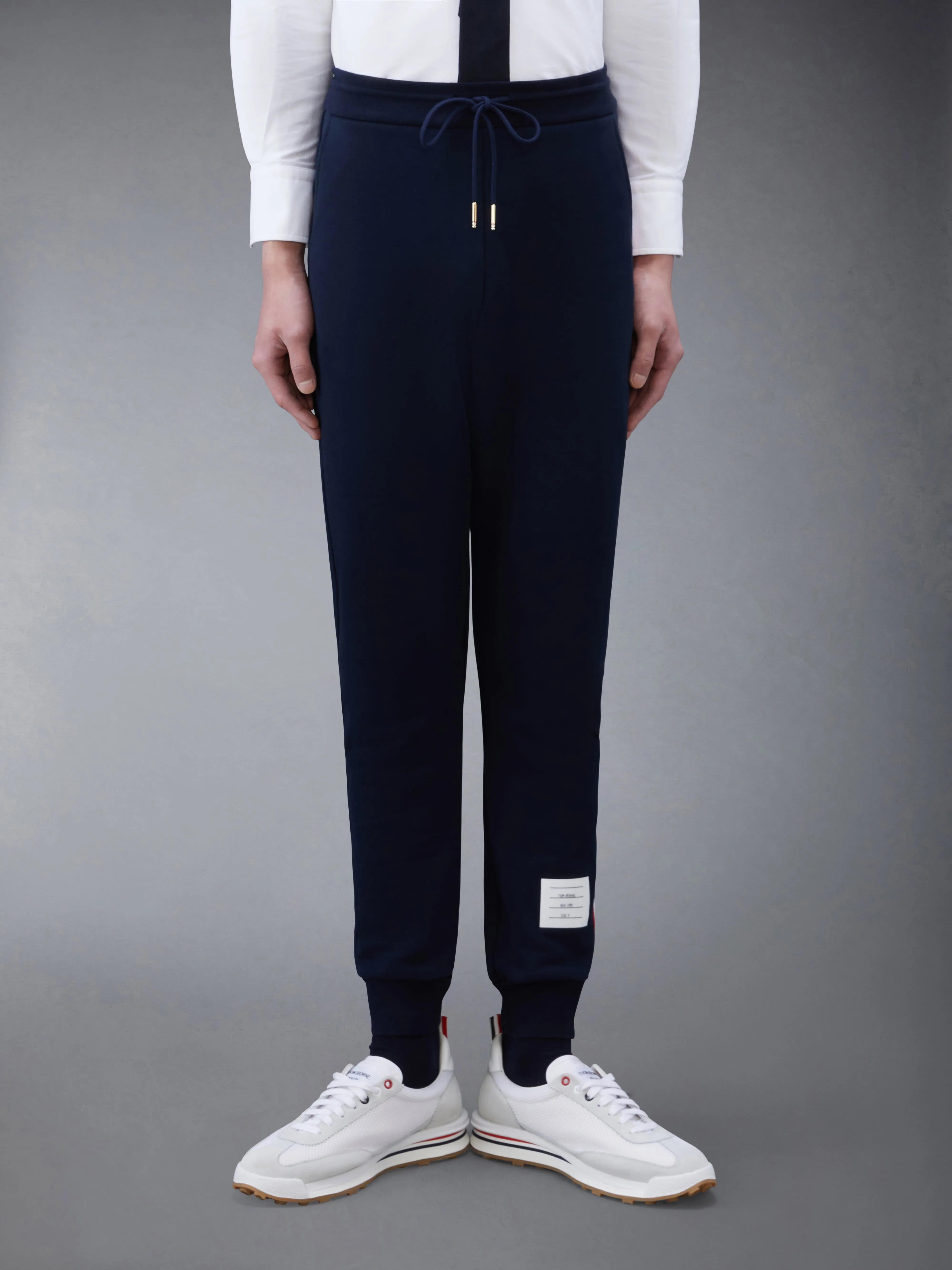 CLASSIC LOOPBACK STRIPE SWEATPANTS sold by Thom Browne