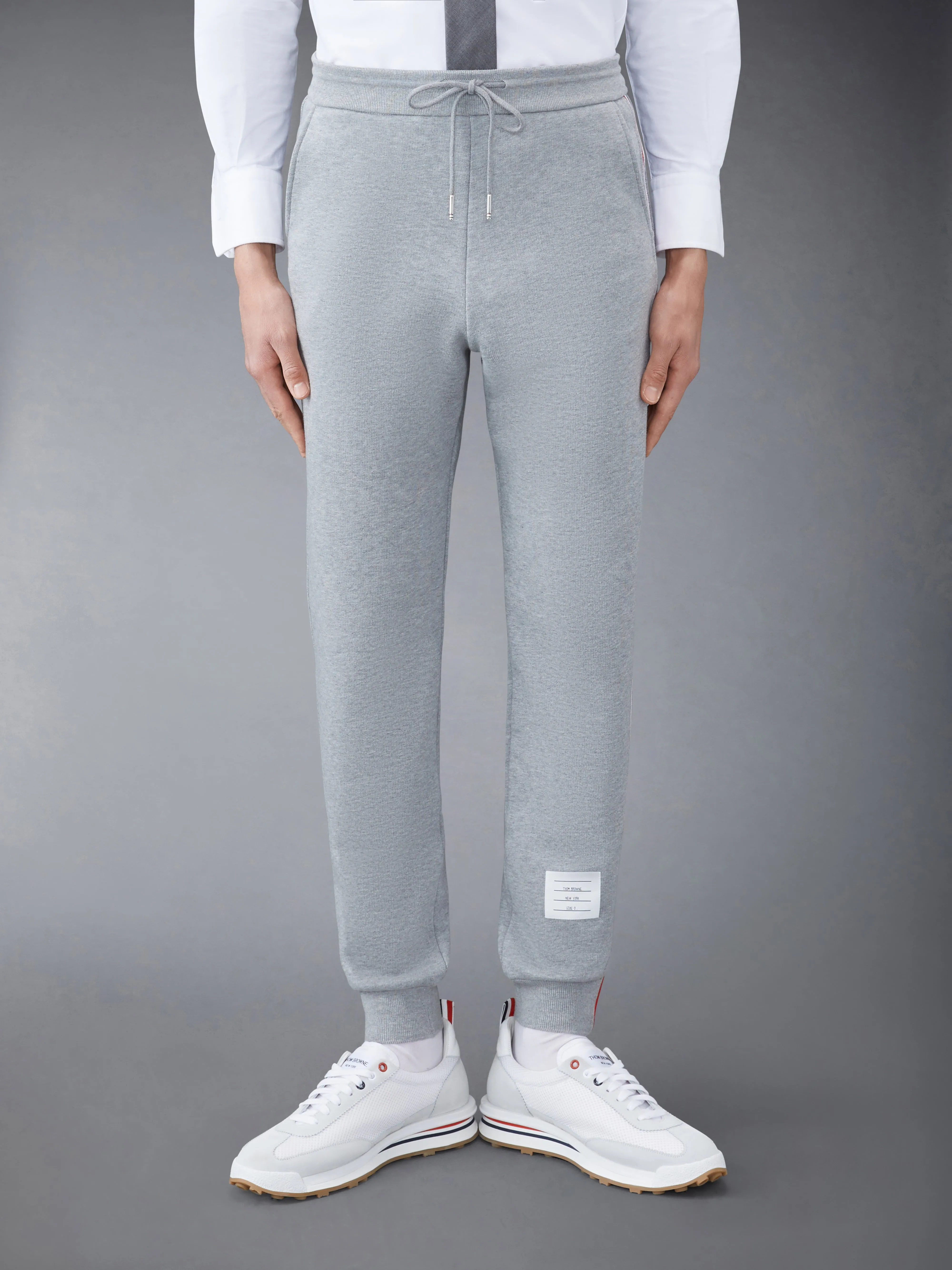 CLASSIC LOOPBACK STRIPE SWEATPANTS sold by Thom Browne