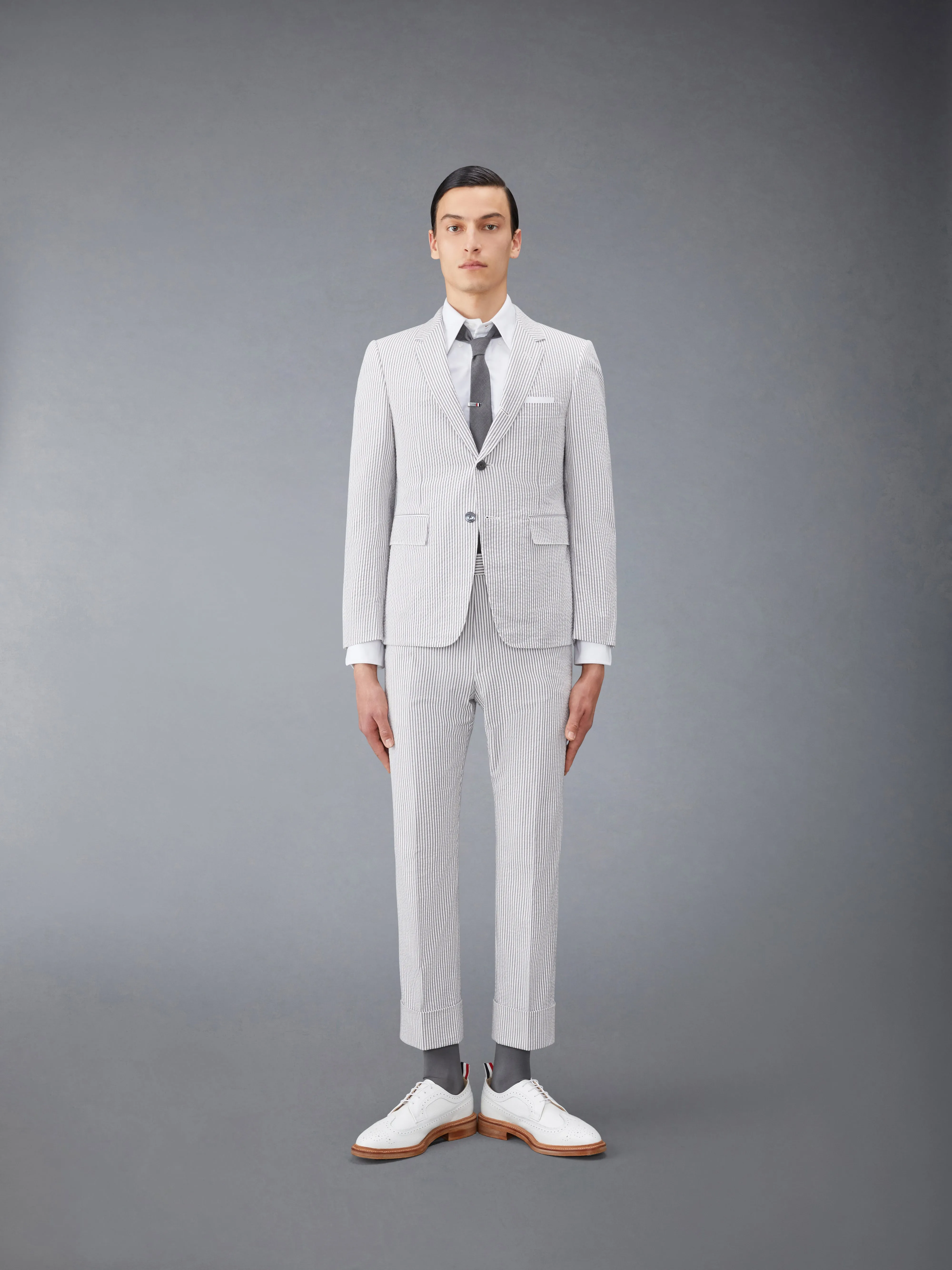 CLASSIC SEERSUCKER BACKSTRAP TROUSERS sold by Thom Browne product image thumbnail 3