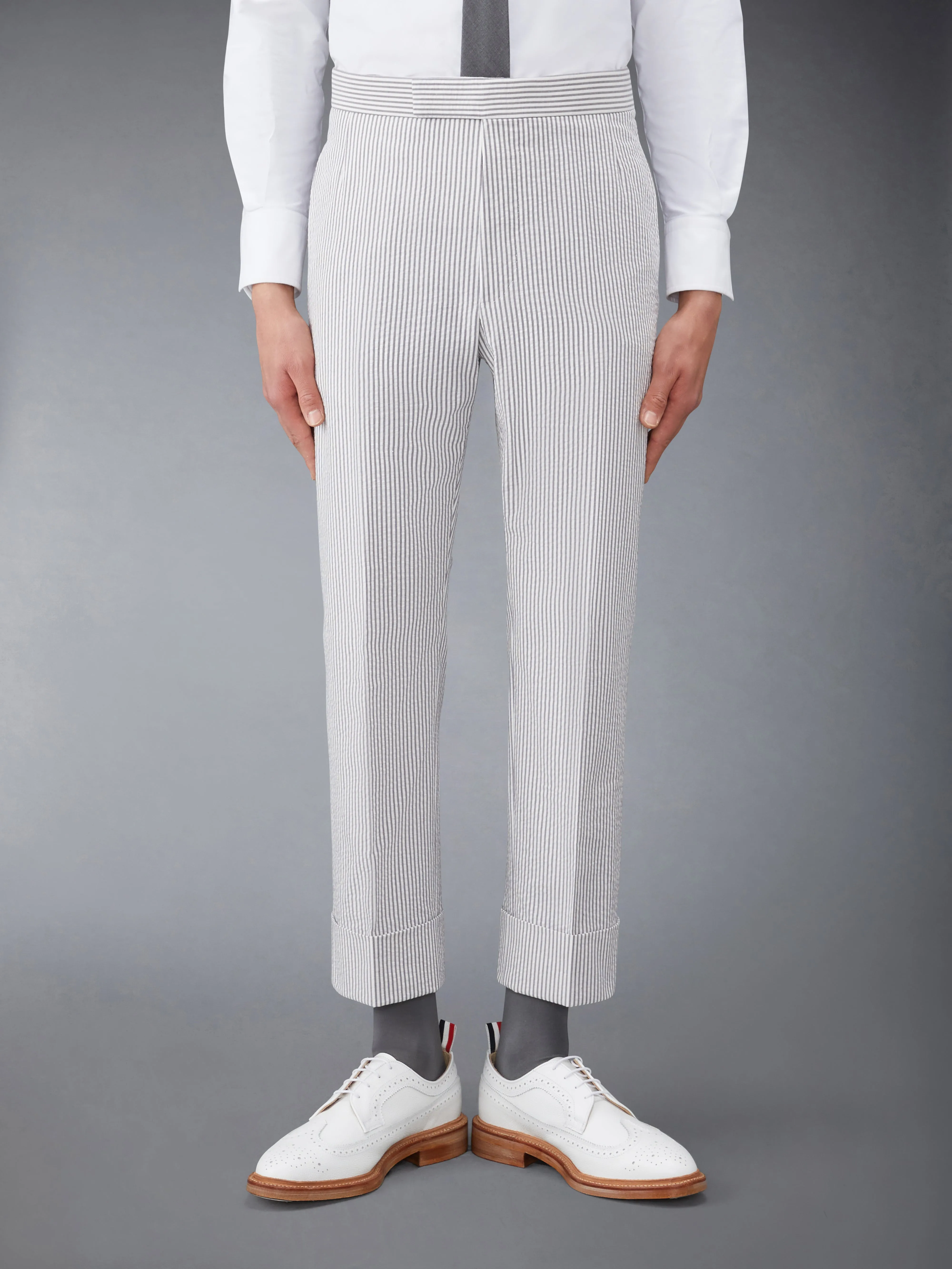 CLASSIC SEERSUCKER BACKSTRAP TROUSERS sold by Thom Browne