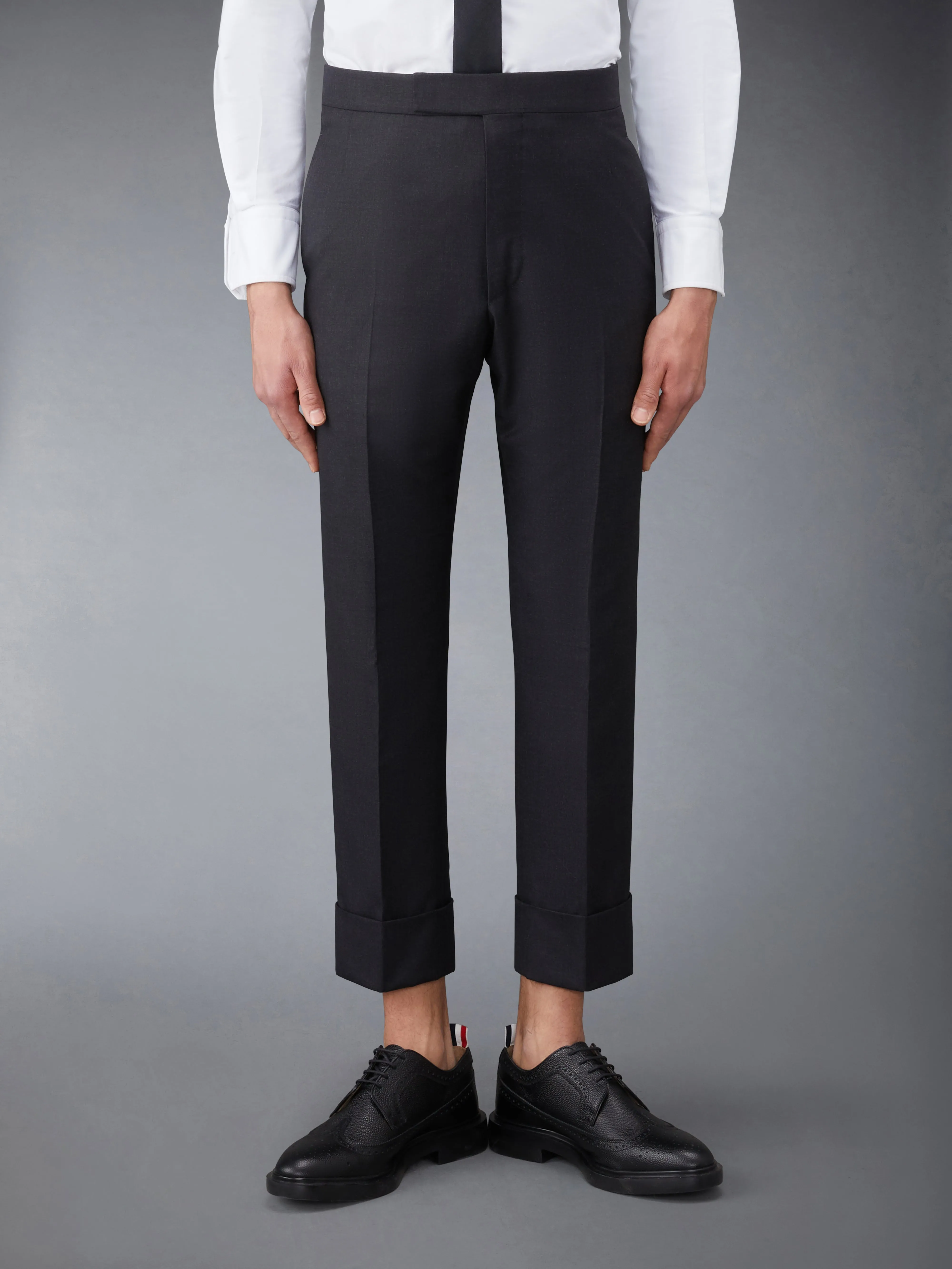CLASSIC TWILL BACKSTRAP TROUSERS sold by Thom Browne