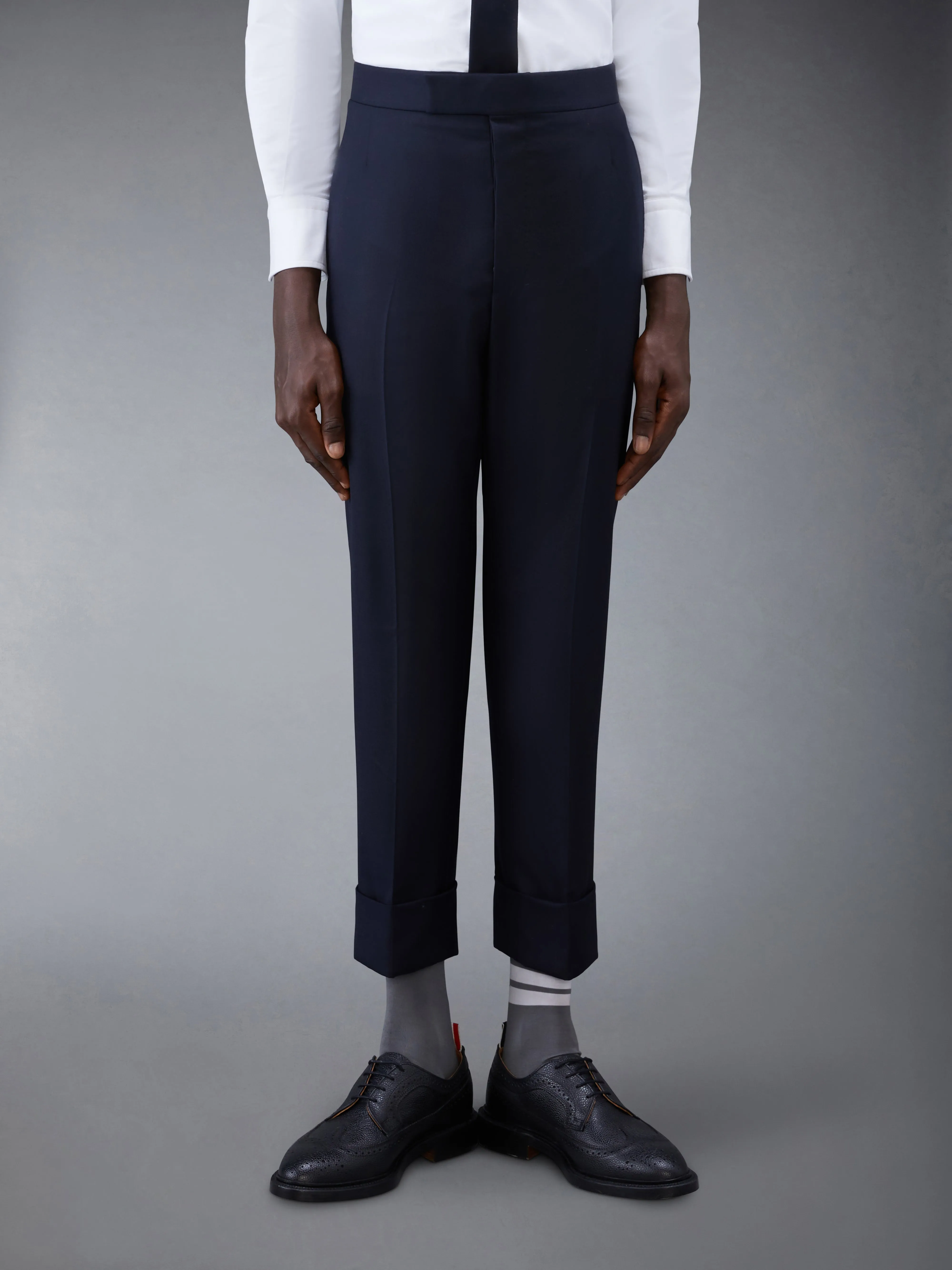CLASSIC TWILL BACKSTRAP TROUSERS sold by Thom Browne