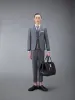 CLASSIC TWILL BACKSTRAP TROUSERS sold by Thom Browne