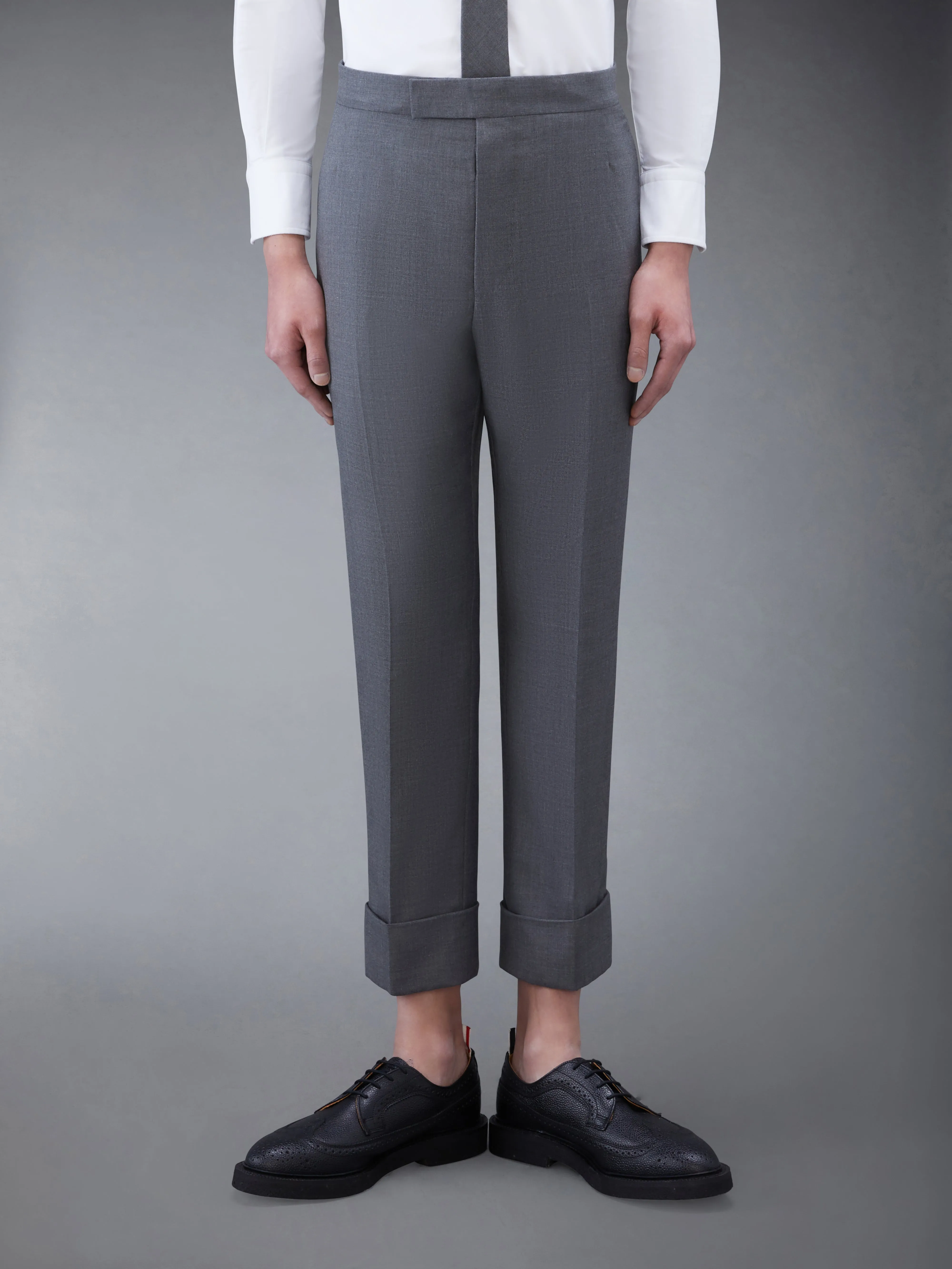 CLASSIC TWILL BACKSTRAP TROUSERS sold by Thom Browne