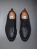 CREPE SOLE LONGWING BROGUE sold by Thom Browne