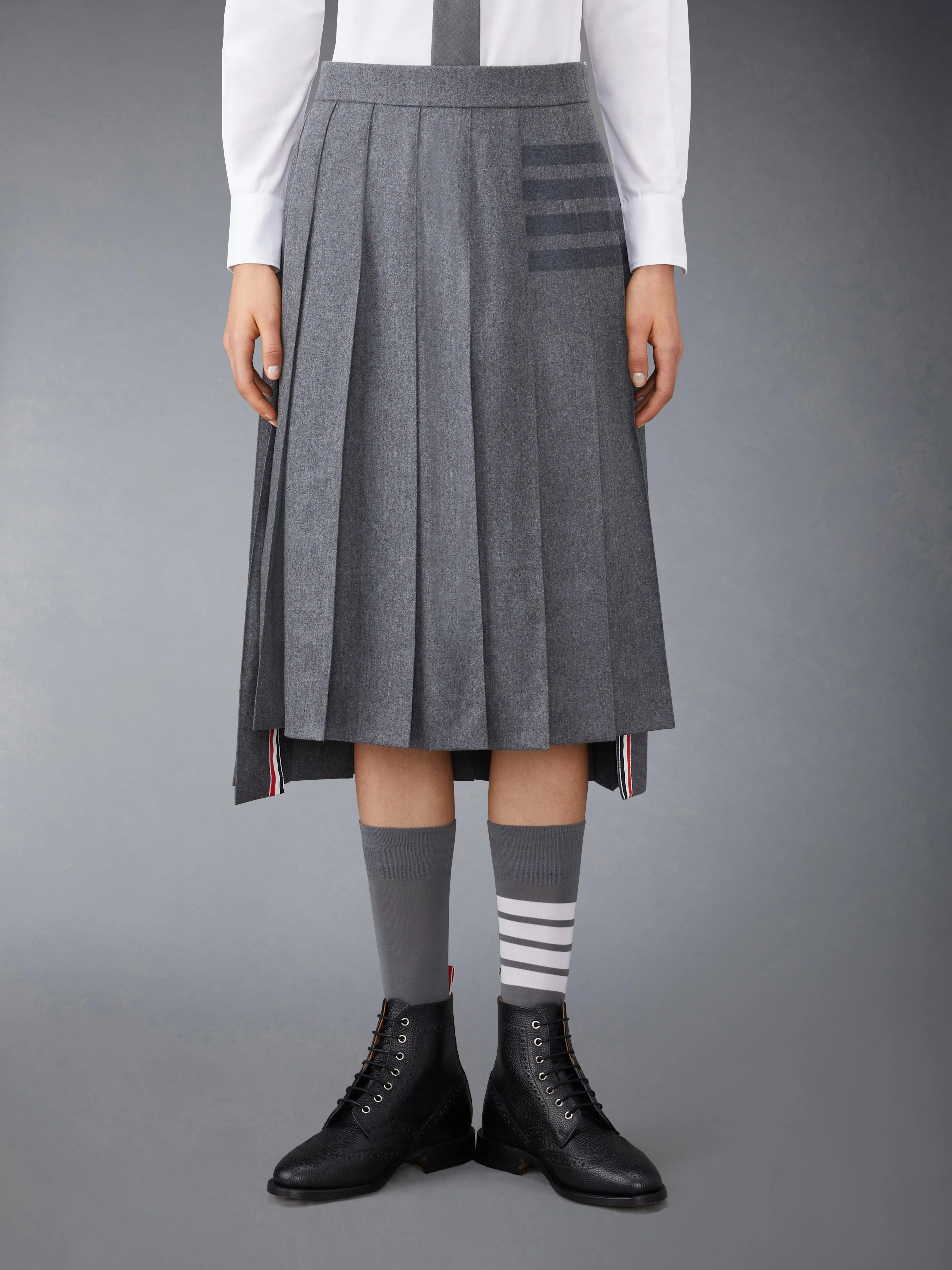 FLANNEL 4-BAR MIDI PLEATED SKIRT sold by Thom Browne