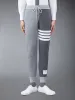 FUNMIX CLASSIC LOOPBACK 4-BAR SWEATPANTS sold by Thom Browne