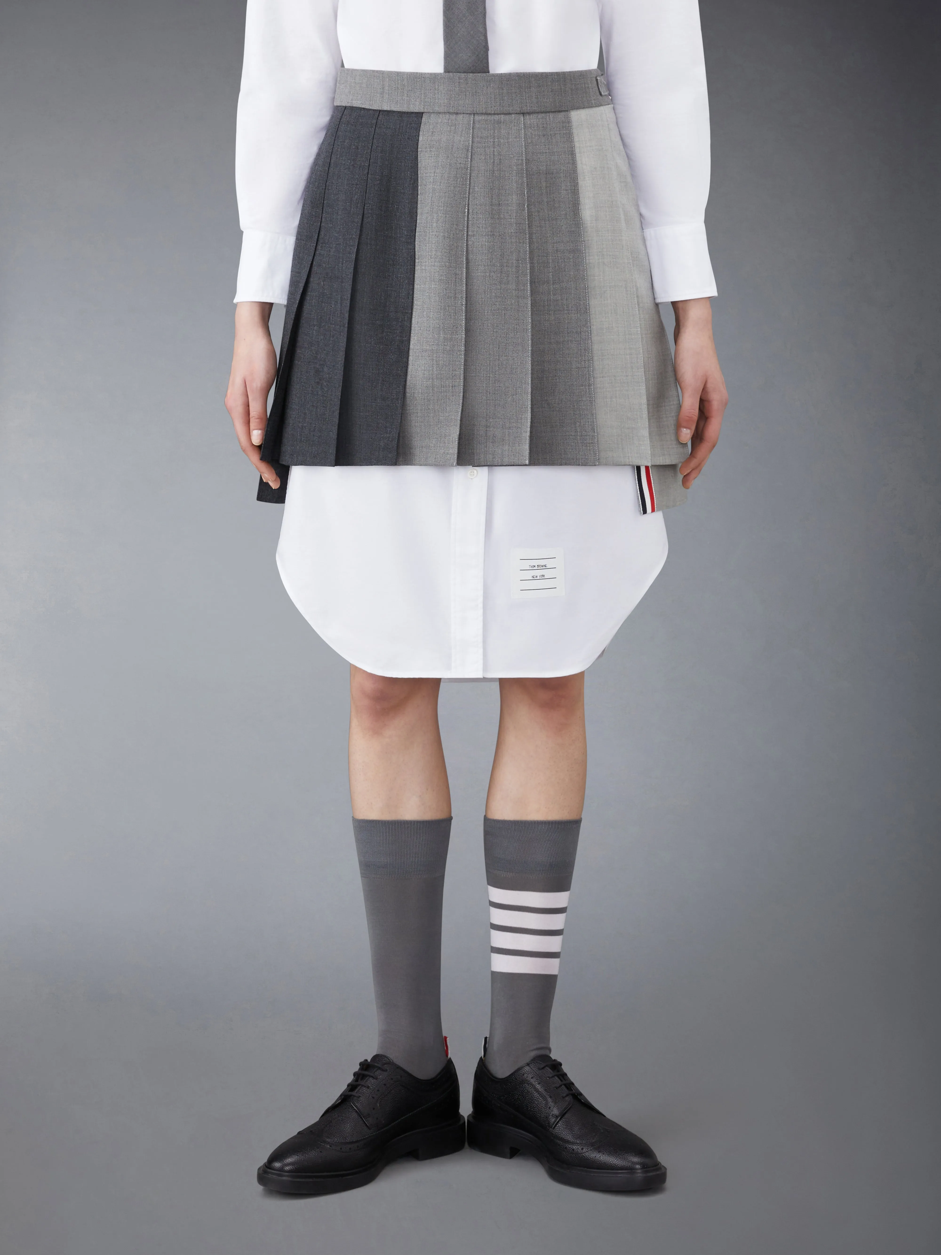 FUNMIX WOOL FRESCO CLASSIC MINI PLEATED SKIRT sold by Thom Browne