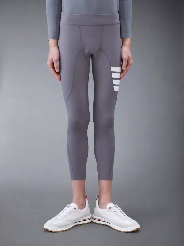 INTERLOCK 4-BAR COMPRESSION TIGHTS sold by Thom Browne