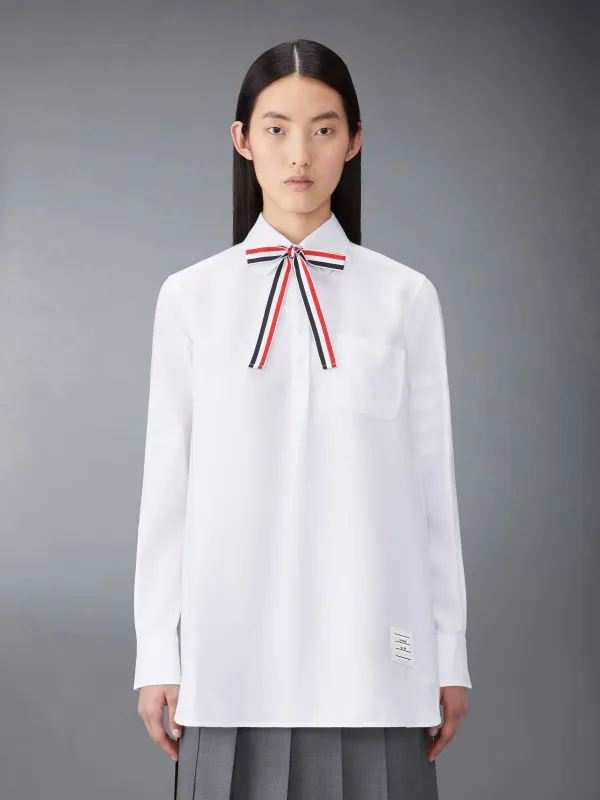 OXFORD 4-BAR BOW TIE BLOUSON sold by Thom Browne