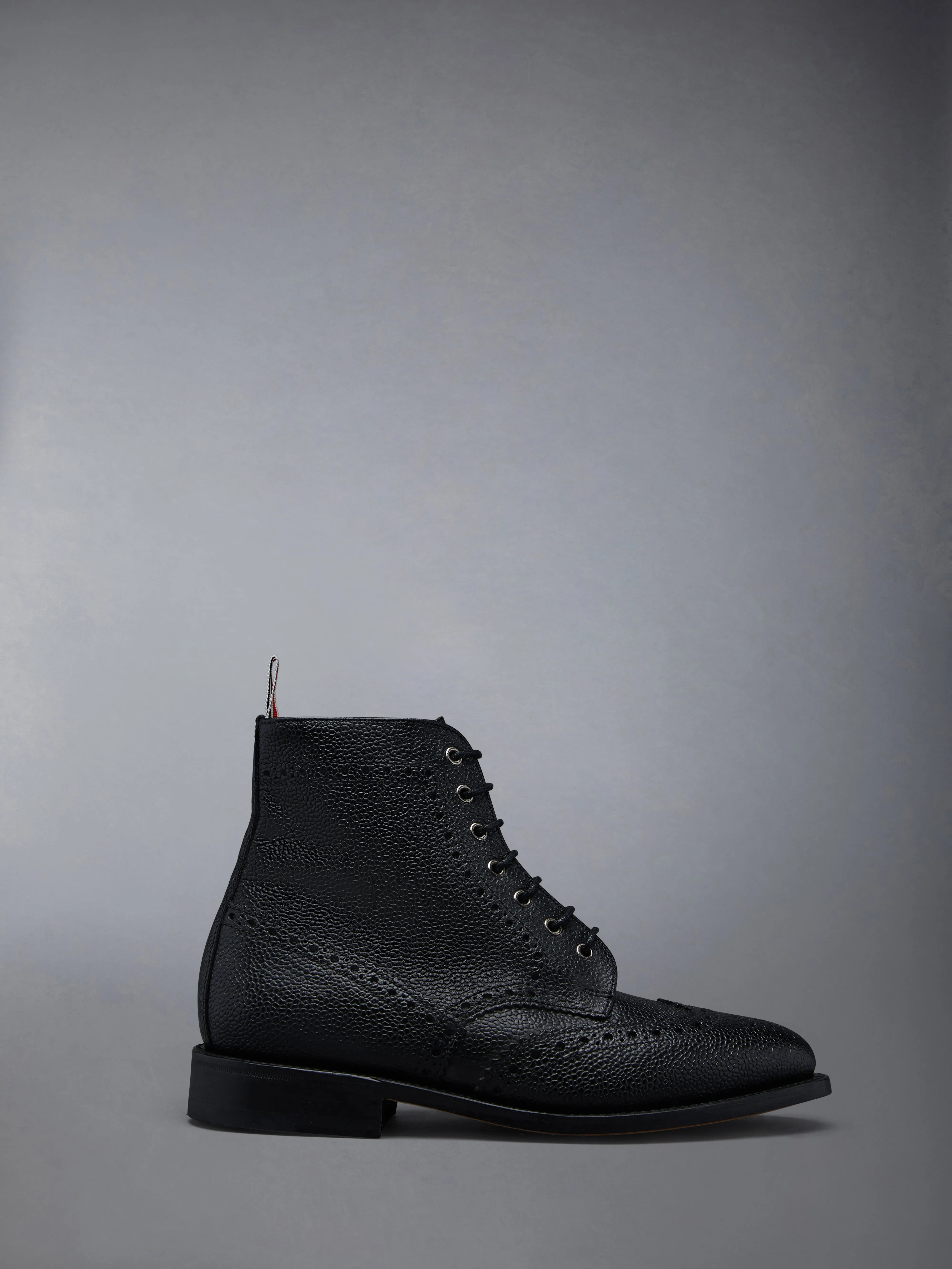 PEBBLE GRAIN LEATHER SOLE WINGTIP BROGUE BOOT sold by Thom Browne