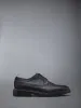 PEBBLE GRAIN RUBBER SOLE LONGWING BROGUE sold by Thom Browne