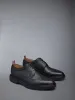 PEBBLE GRAIN RUBBER SOLE LONGWING BROGUE sold by Thom Browne