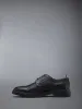 PEBBLE GRAIN RUBBER SOLE LONGWING BROGUE sold by Thom Browne