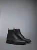 PEBBLE GRAIN WINGTIP BOOT sold by Thom Browne