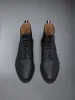 PEBBLE GRAIN WINGTIP BOOT sold by Thom Browne