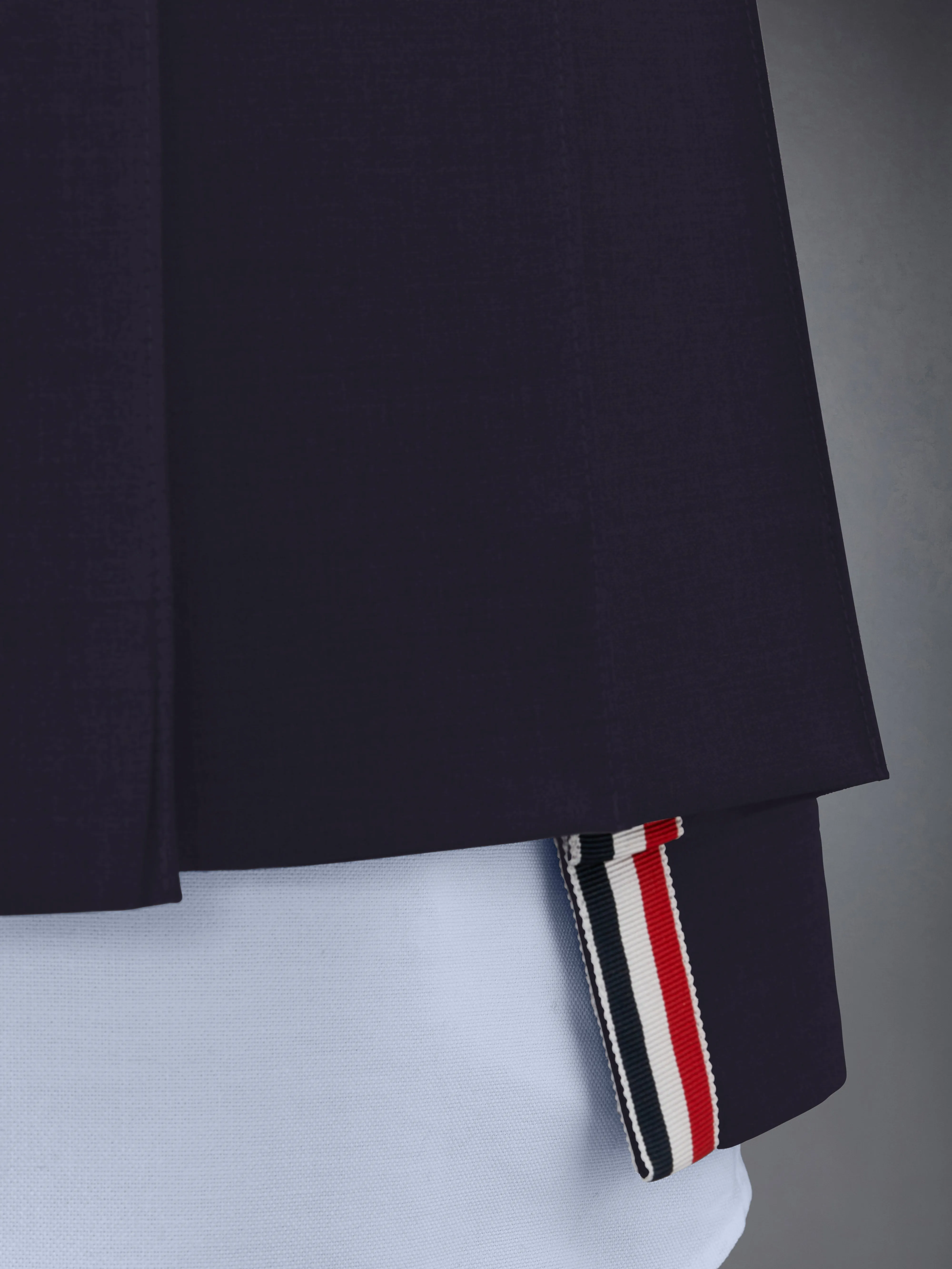 PLAIN WEAVE 4-BAR MINI PLEATED SKIRT sold by Thom Browne product image thumbnail 5