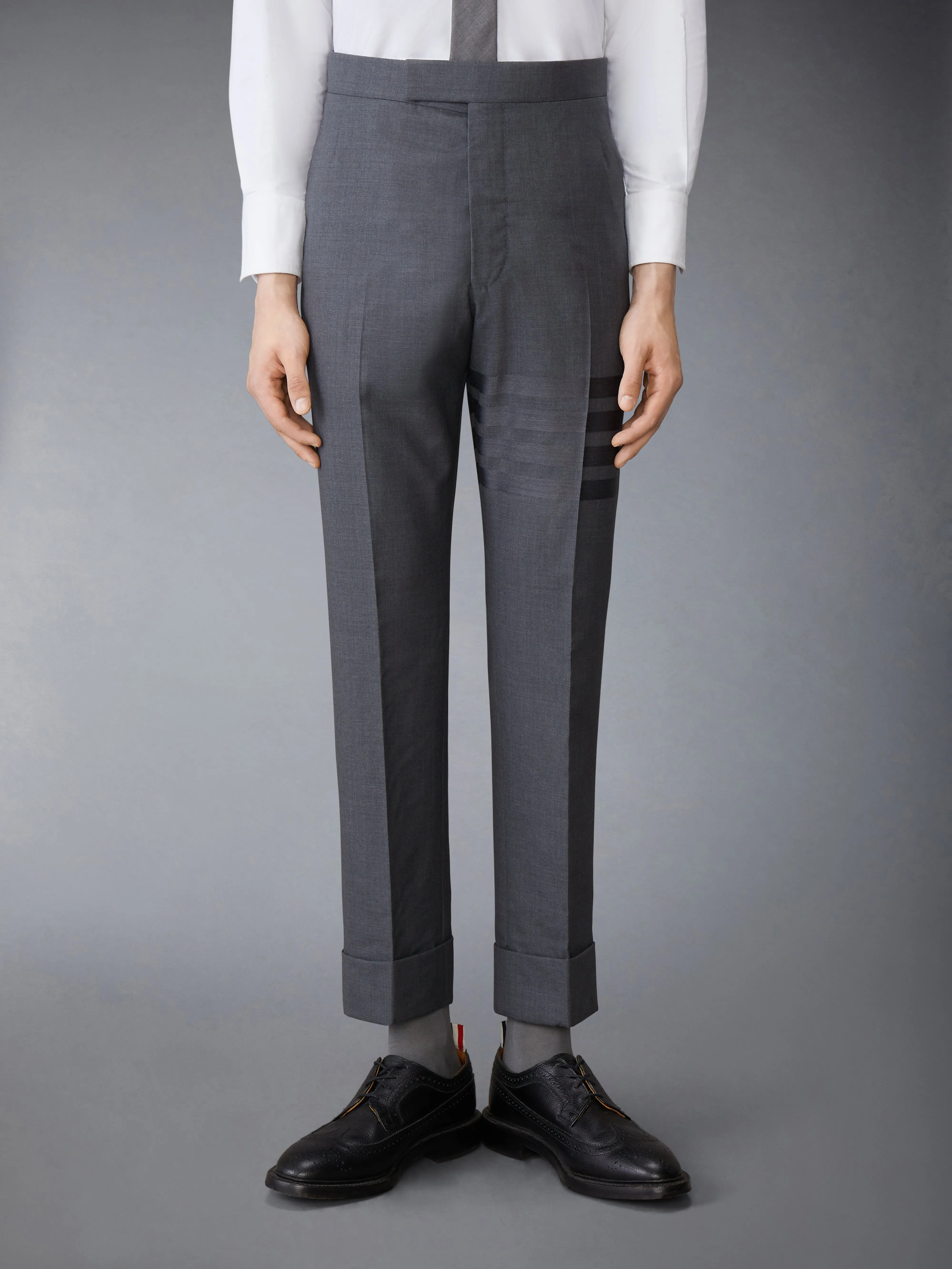 PLAIN WEAVE SUITING 4-BAR CLASSIC BACKSTRAP TROUSERS sold by Thom Browne