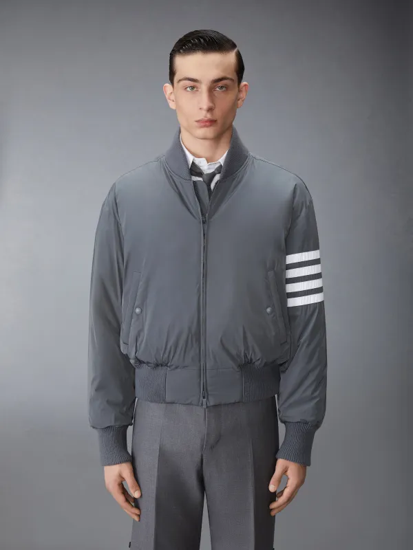 POLY TWILL 4-BAR OVERSIZED BLOUSON JACKET sold by Thom Browne