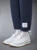 RIPSTOP MESH 4-BAR SWEATPANTS sold by Thom Browne