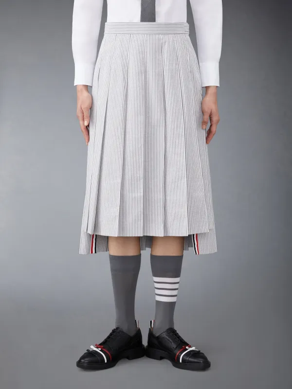 SEERSUCKER MIDI PLEATED SKIRT sold by Thom Browne