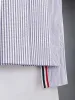 SEERSUCKER MINI PLEATED SKIRT sold by Thom Browne