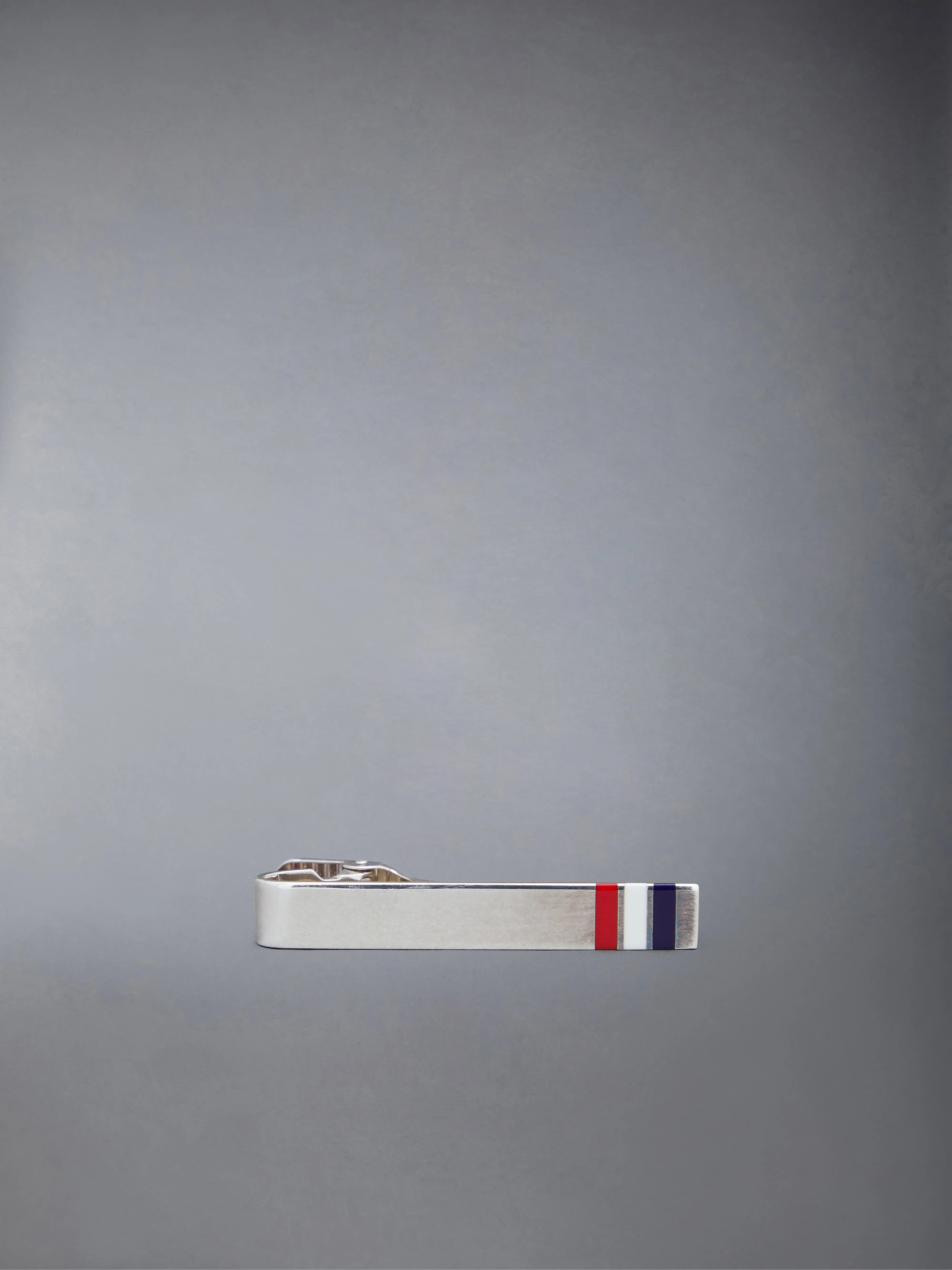 SILVER ENAMEL STRIPE LONG TIE BAR sold by Thom Browne