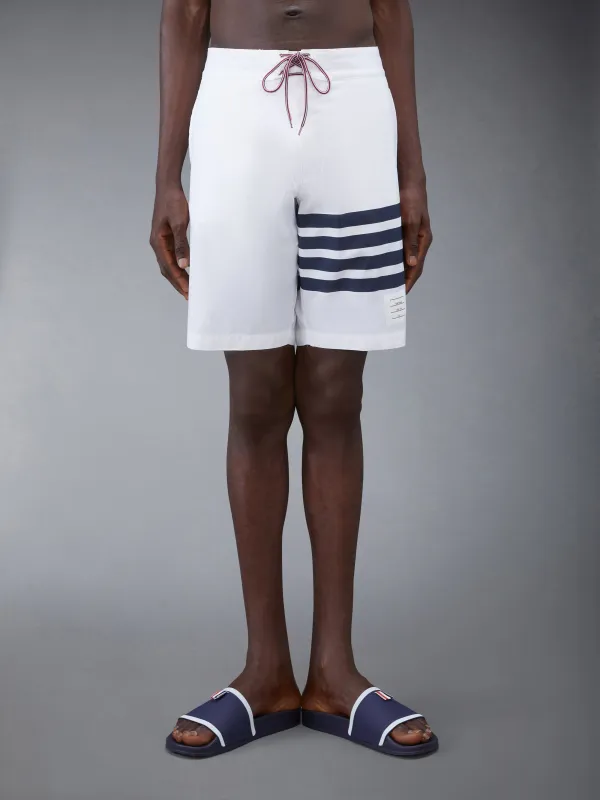 SWIM TECH 4-BAR BOARD SHORTS sold by Thom Browne