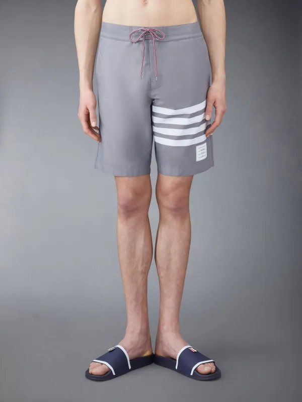 SWIM TECH 4-BAR BOARD SHORTS sold by Thom Browne