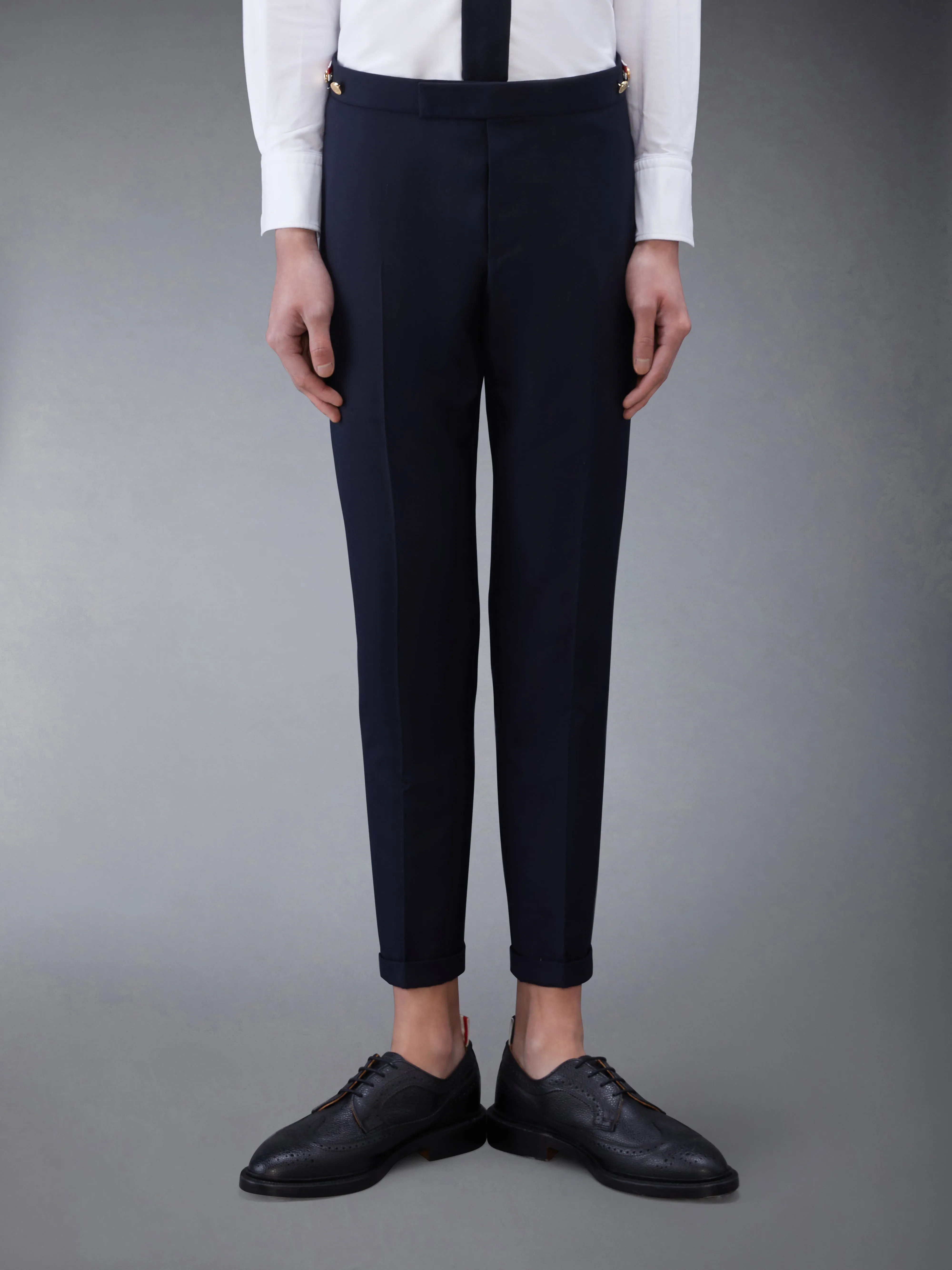TWILL LOW RISE TROUSERS sold by Thom Browne